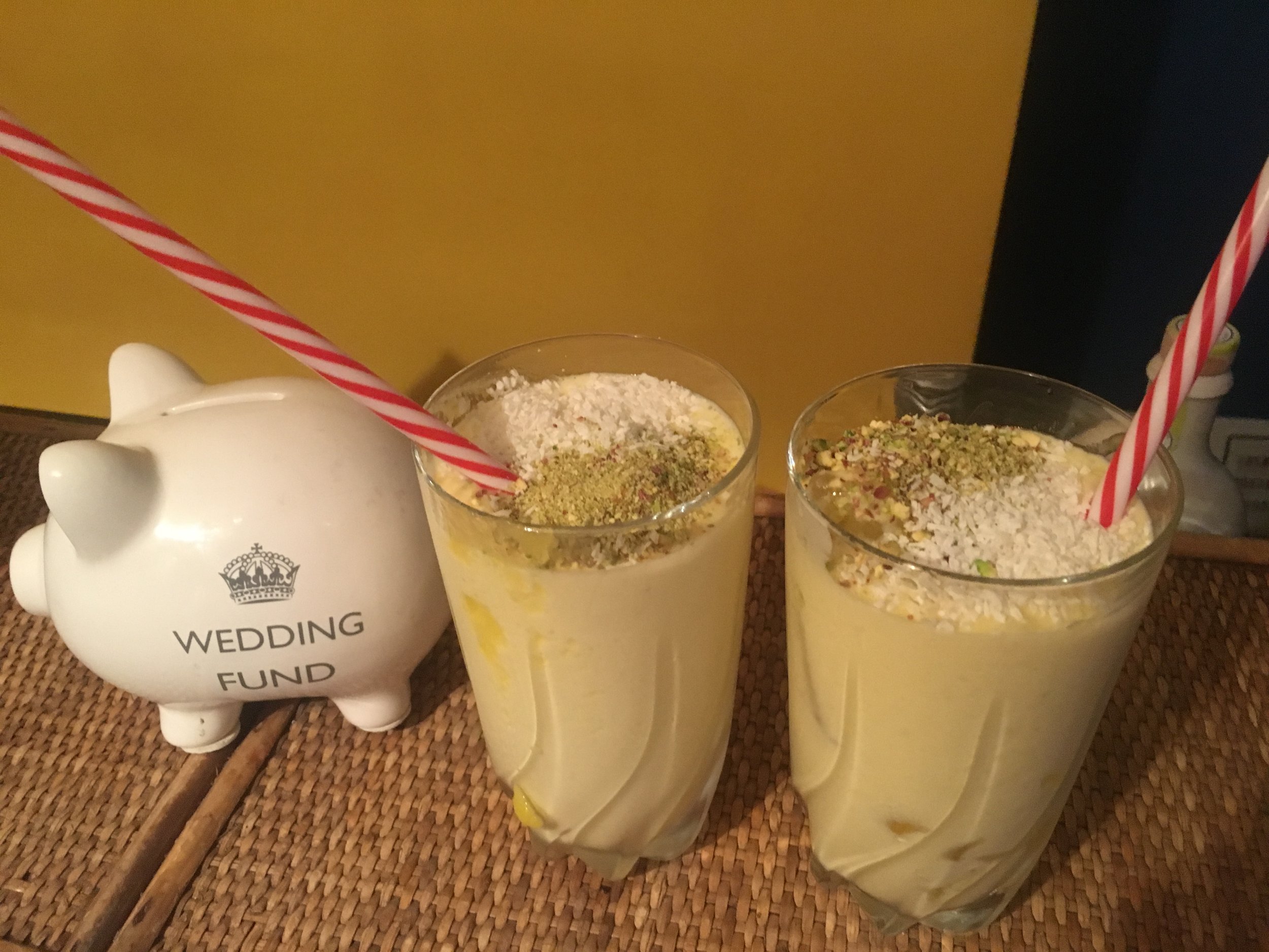 Method 1. Blend one Mango with Ice and two tbsp of Greek Yogurt 2. Top with crushed Pistachios and Desiccated Coconut 3. Serve in a tall glass and long straw for mixing 4. Yum!