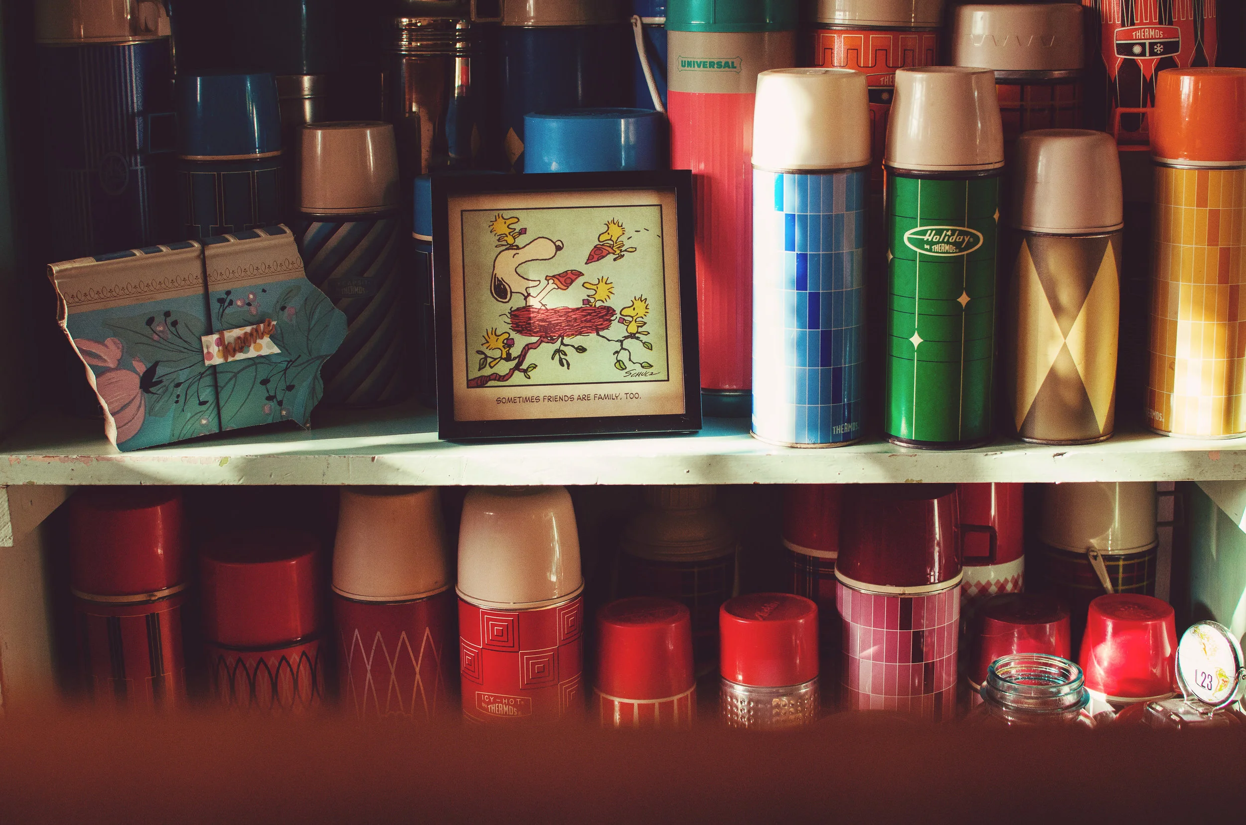 Colorful, vintage thermoses makes a pretty kitchen kitchen display. H.Prall & Co. | hprallandco.com