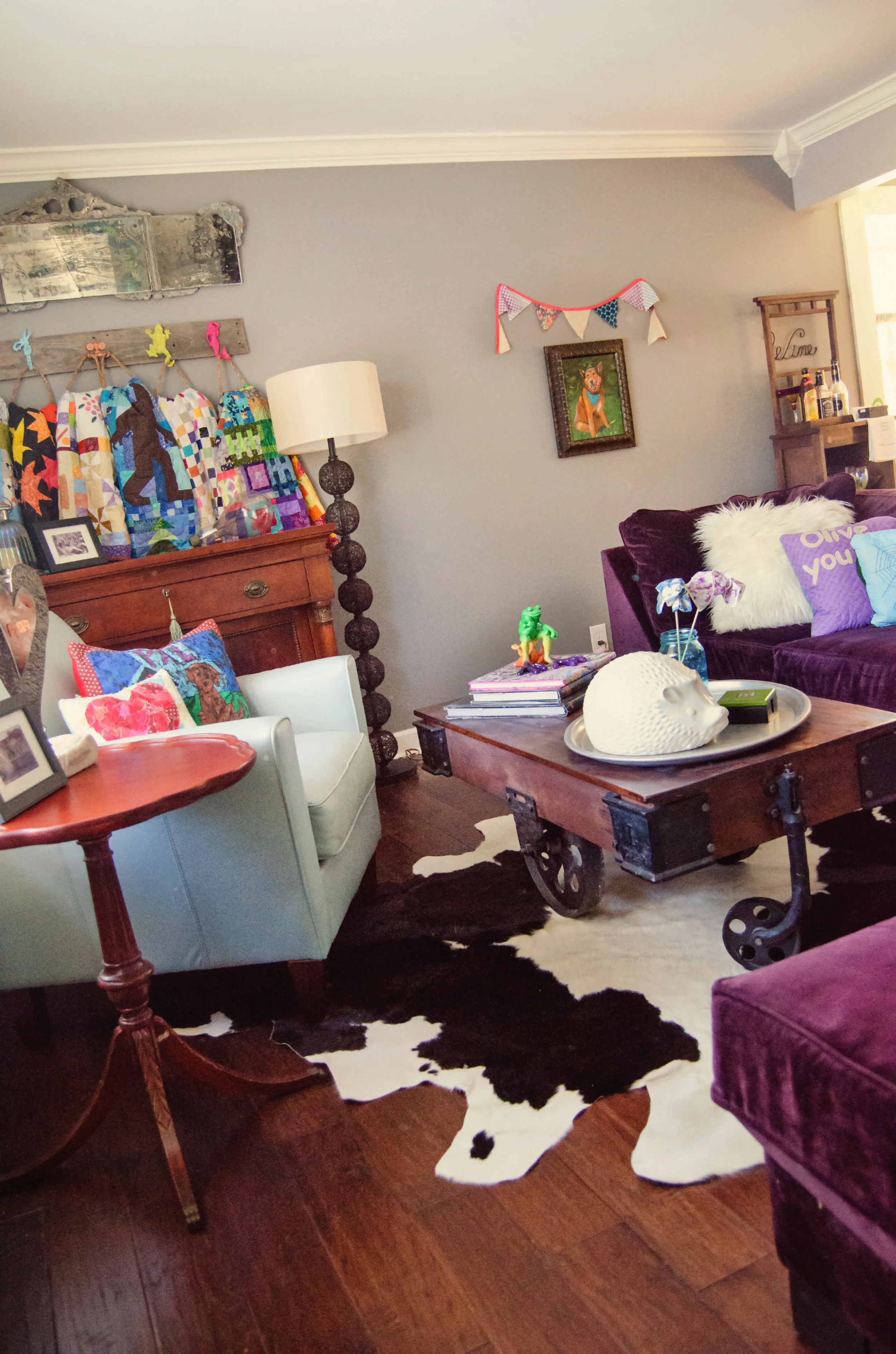 Living room design with purple couches. | hprallandco.com