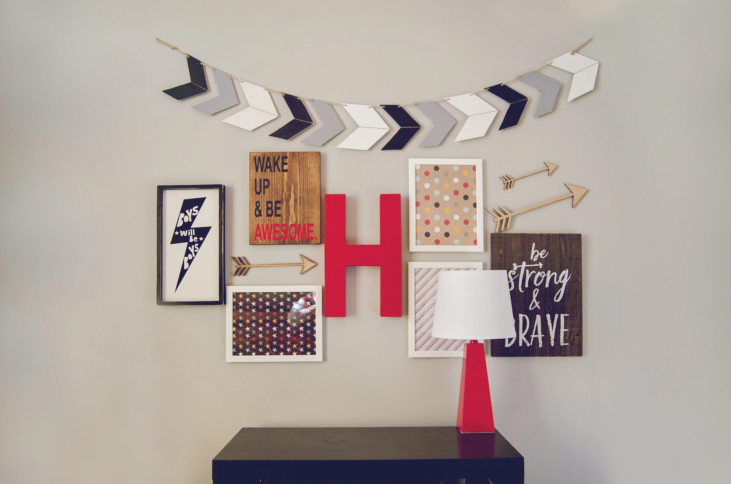 Boys room gallery wall with red, gray, and white. | hprallandco.com