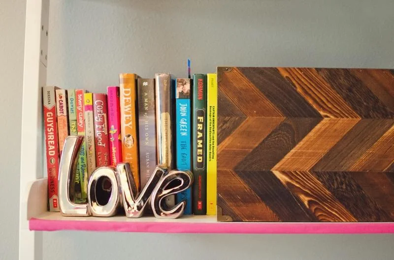 Colorful bookshelf via H.Prall & Co. | hprallandco.com