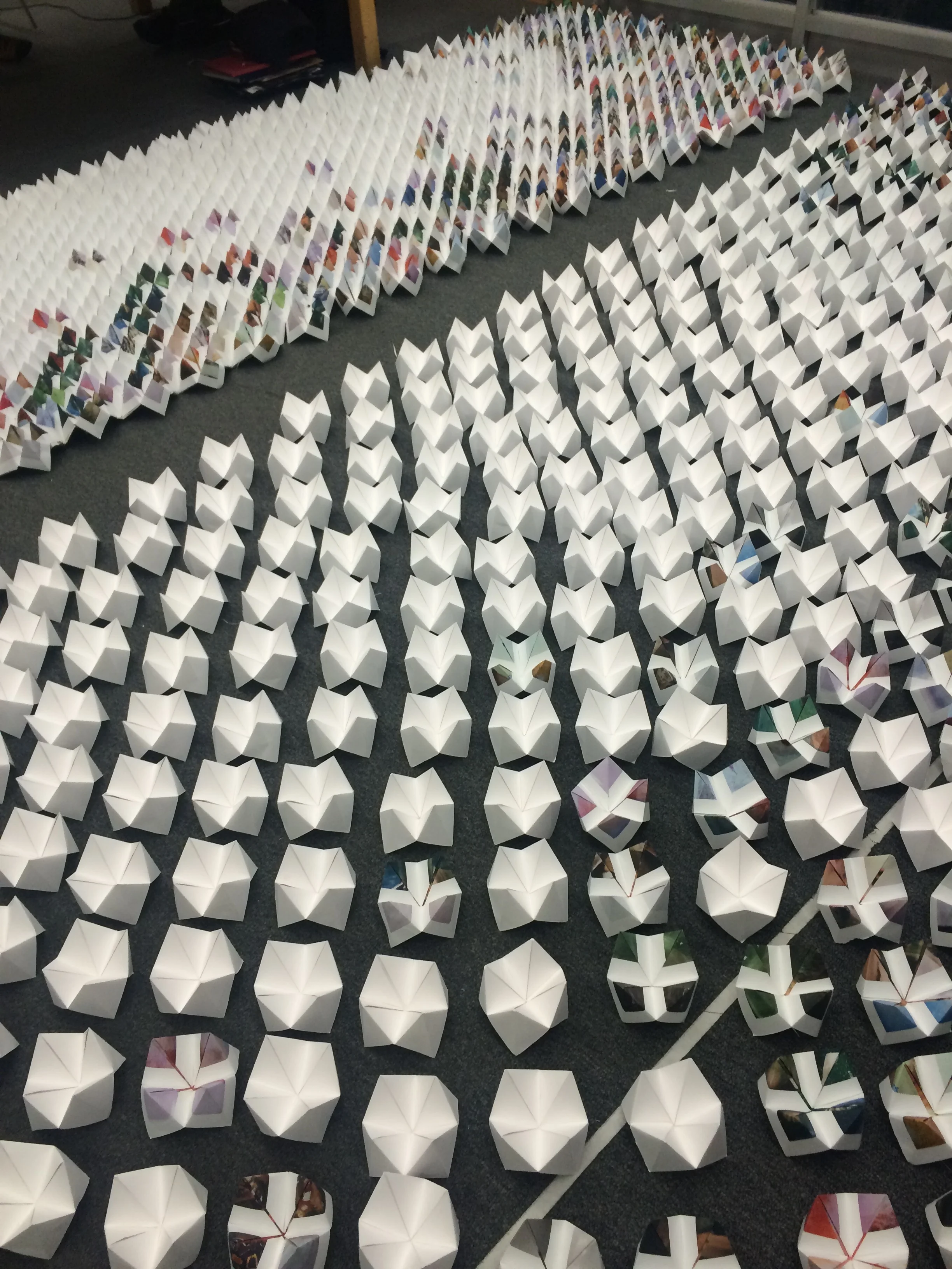  4,000 pieces were folded in 5 days. White ones were laid out carefully to highlight the First Lady’s blue dress.&nbsp; 