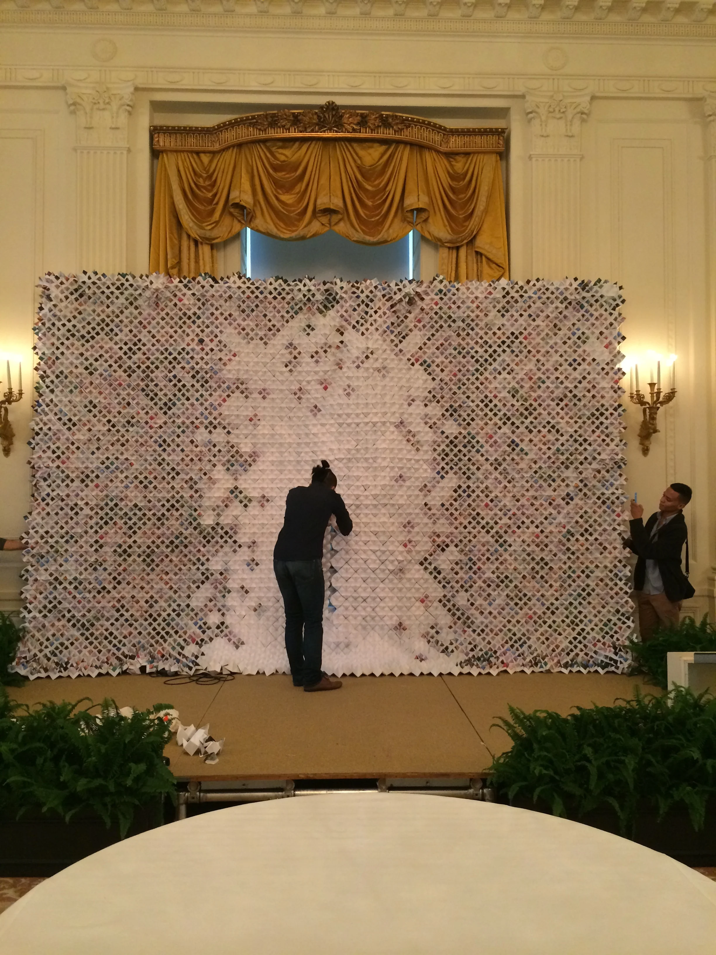  Four panels were combined into one 8 ft. by 16 ft. backdrop in the White House East Room. 