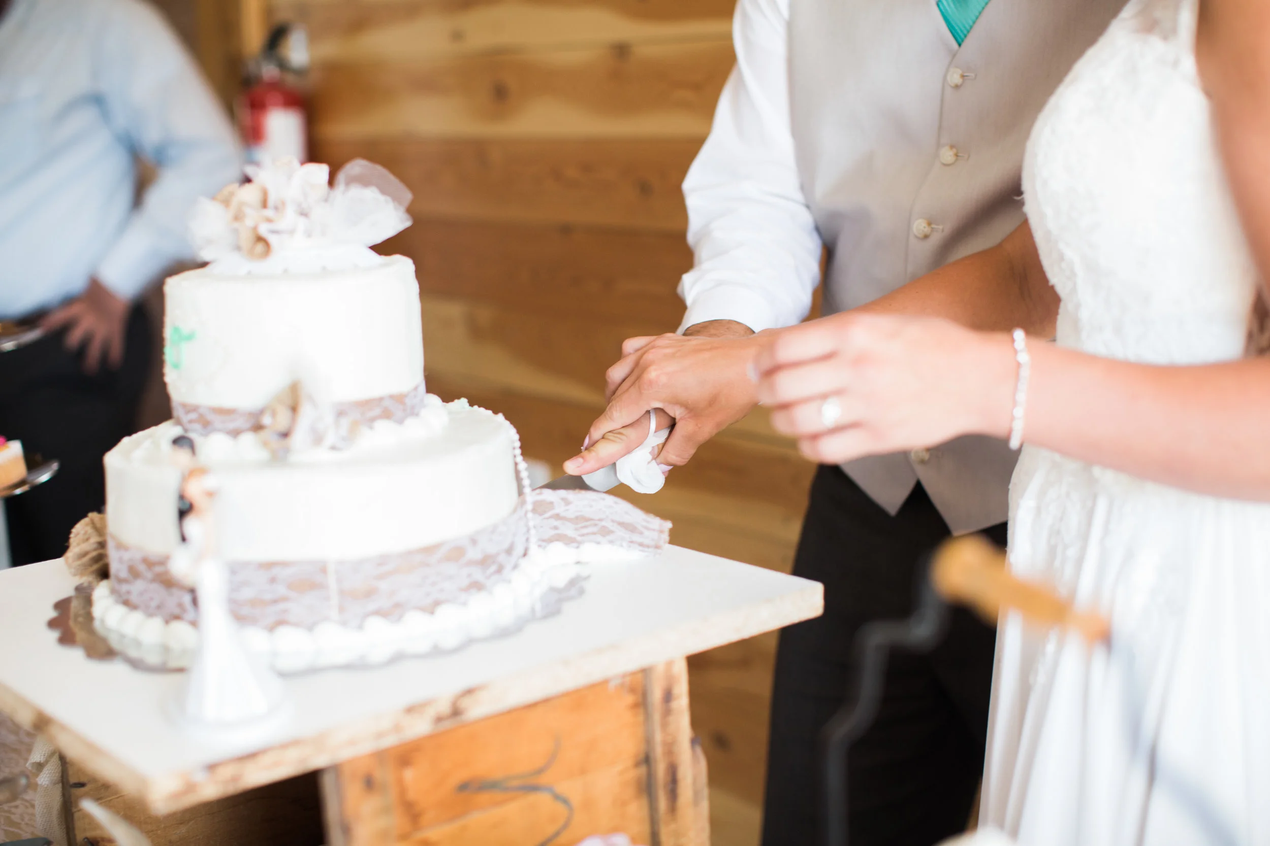 Cutting the Wedding Cake | Rugged Horizon | Montana Wedding Venue