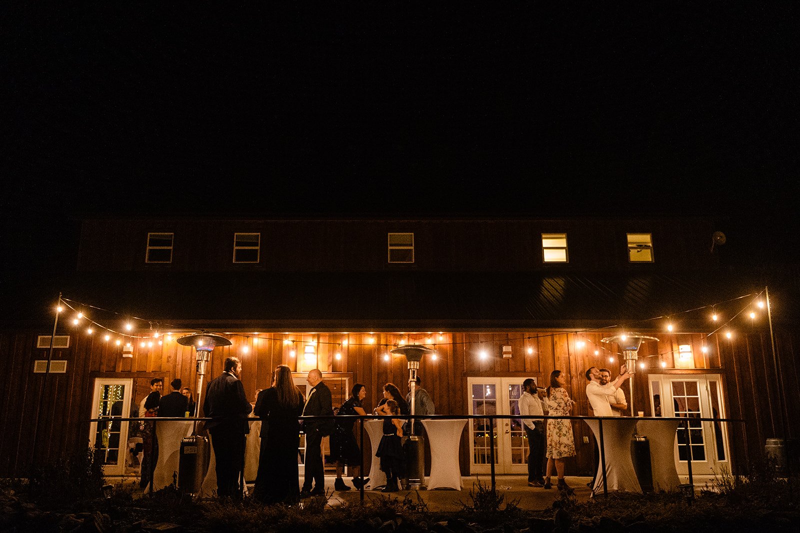 Socialize Under Bistro Lights During Fall Wedding
