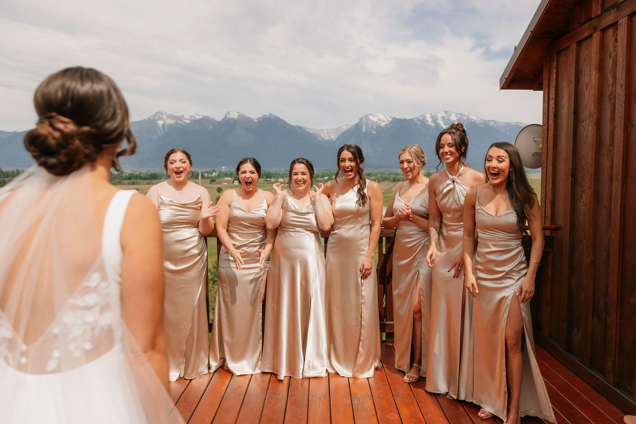 First Look with Bridesmaids on Loft Balcony at Rugged Horizon