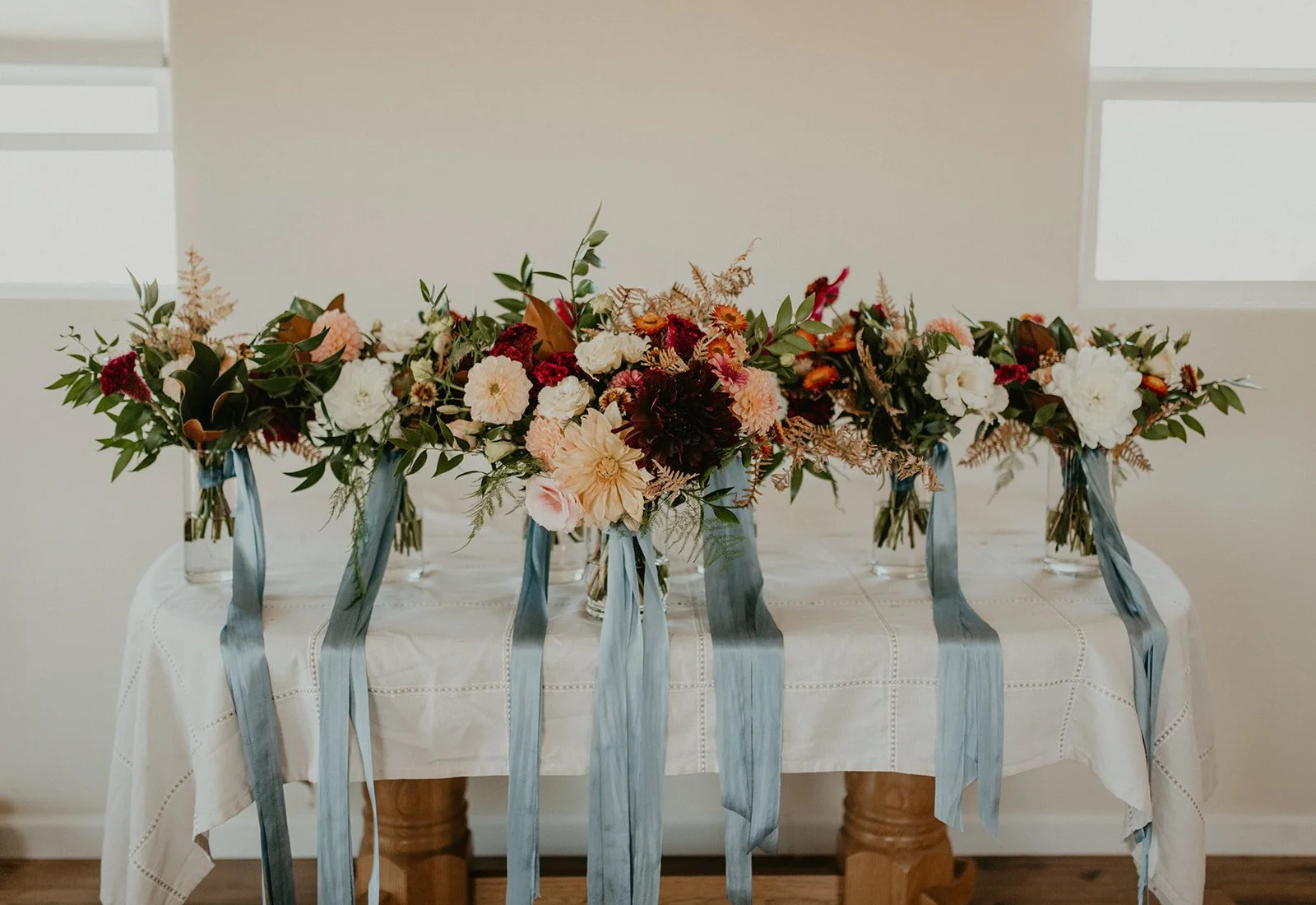 Fall Wedding Bouquets in Loft Apartment at Rugged Horizon Wedding Venue
