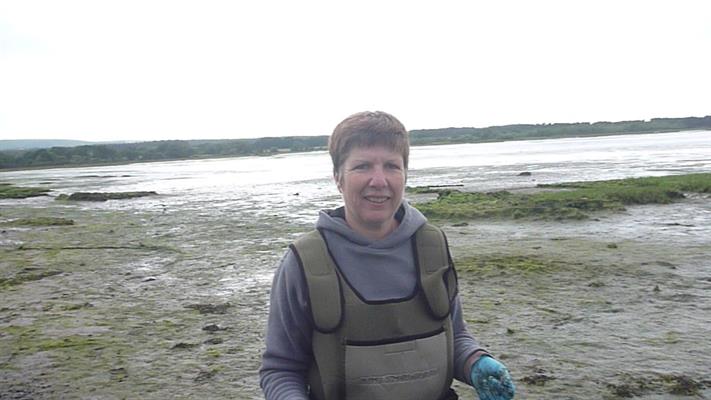 Ann's idea of fun? Conducting research in the mudflats of Southern England.