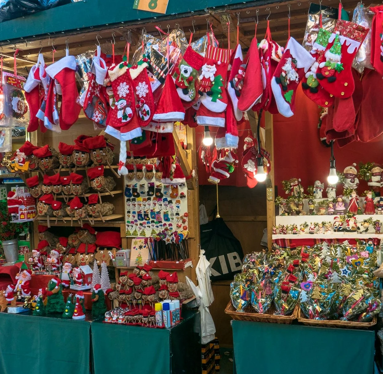 Silly stockings, Santa hats, and mistletoe in the Christmas market, Barcelona, Spain. 