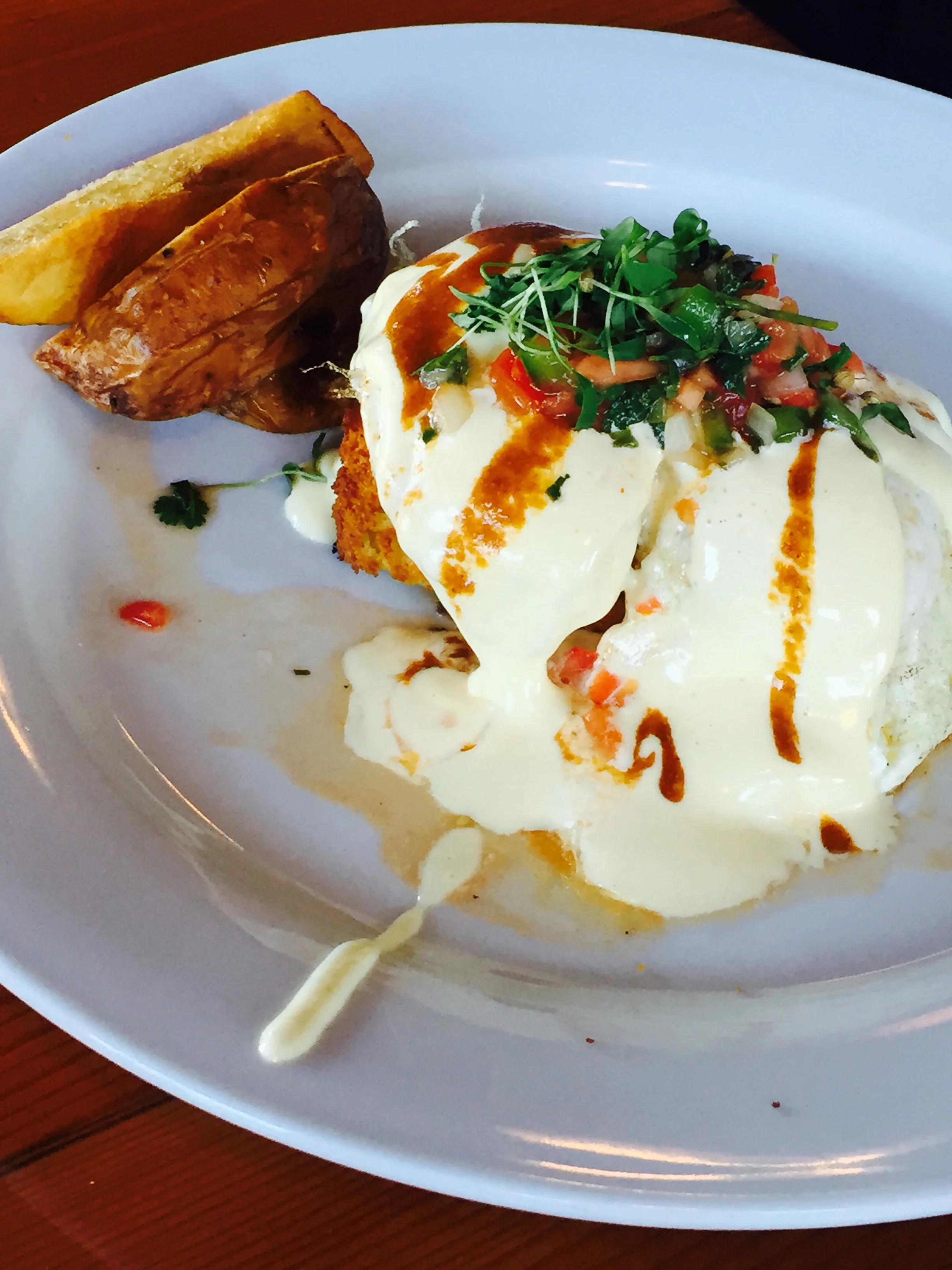 Avenida Del Lago: Two eggs, pulled bison, cojita, pico de gallo, cornbread, picante, hollandaise.