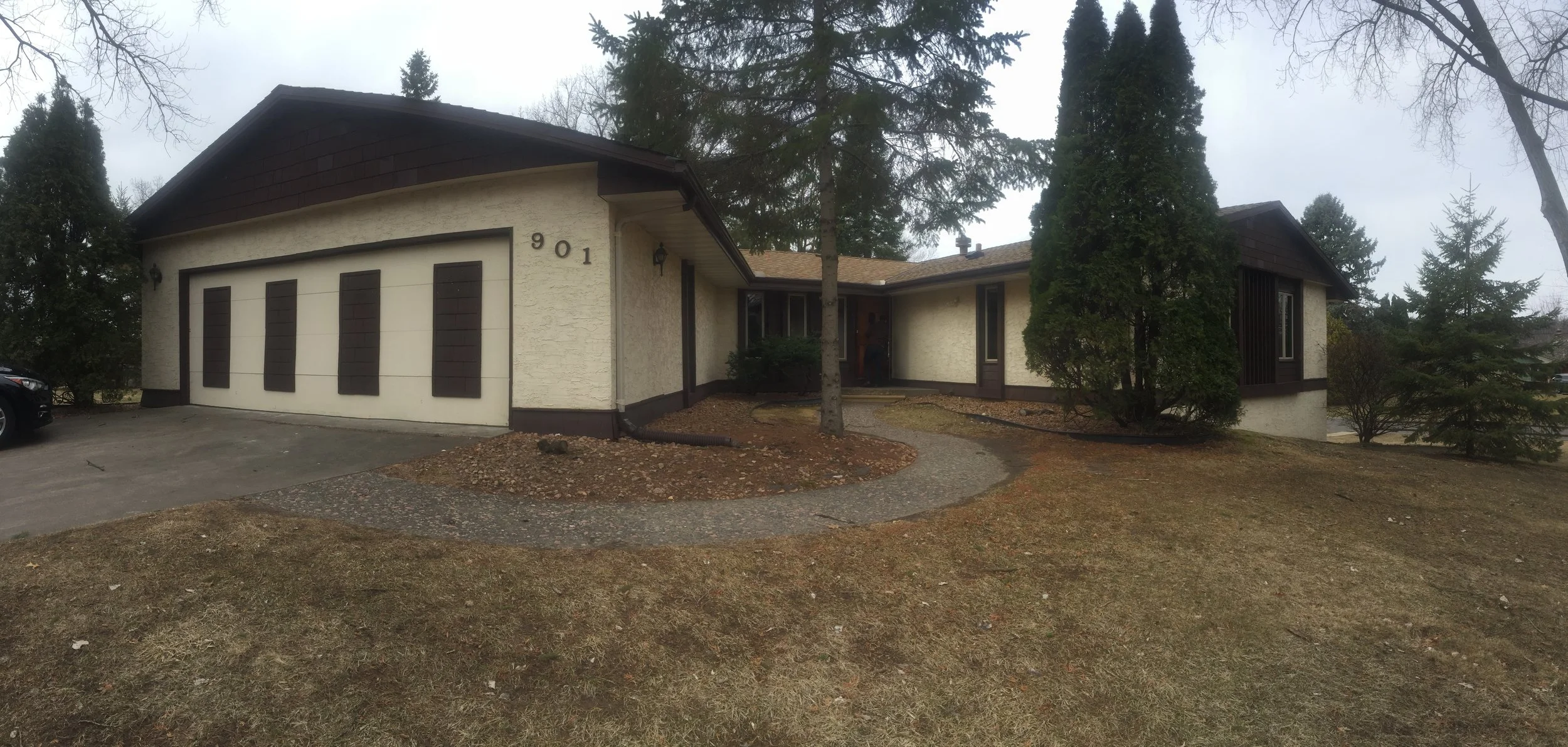 The exterior is a work in progress - but we loved the unique shape and layout of the home.