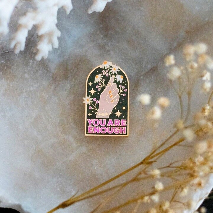 A friendly heads up that we're down to our last ~five~ of @manonlouart's &quot;You Are Enough&quot; pins. A couple color-ways are long gone, last chance on these!