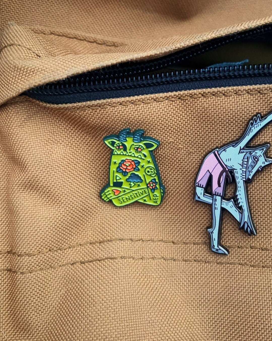 It's been a few weeks since we've done a custom pin Thursday... how about these lil sad bois we made for @abigailepenner? 🥲 Custom olive-green painted-plating with soft enamel! These sold out almost instantly, so we have more in production right now