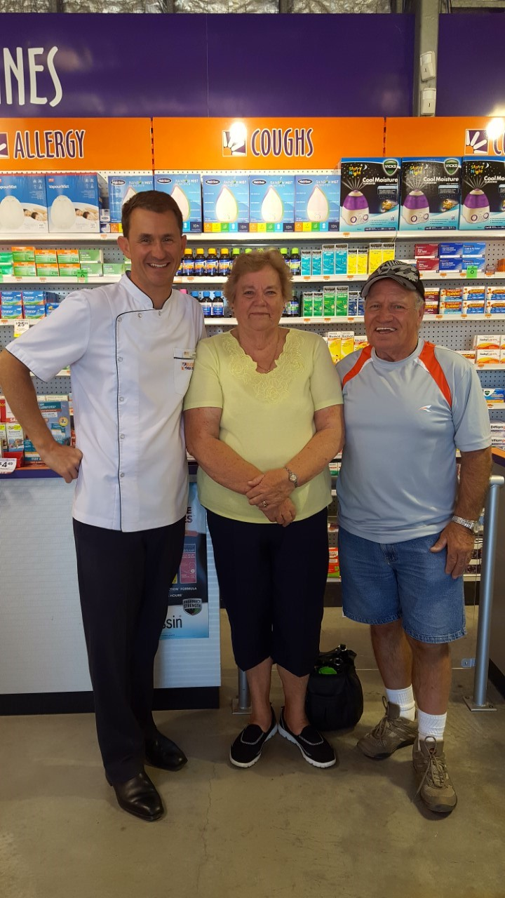 Second prize winner Tom with Jamie from Innaloo Discount Drug Store