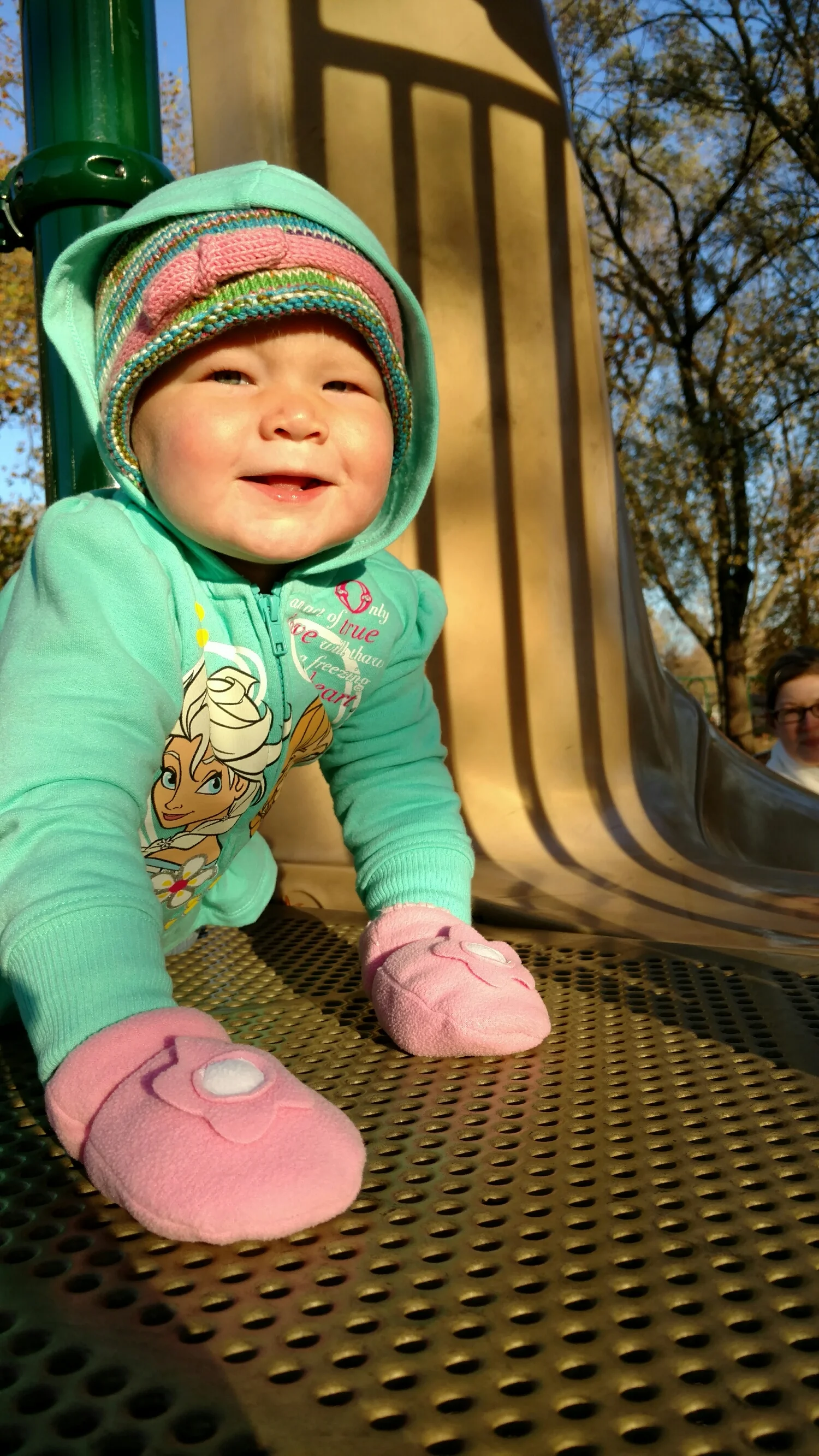 Emma likes the slide at the playground. Her life pretty much rules right now. 