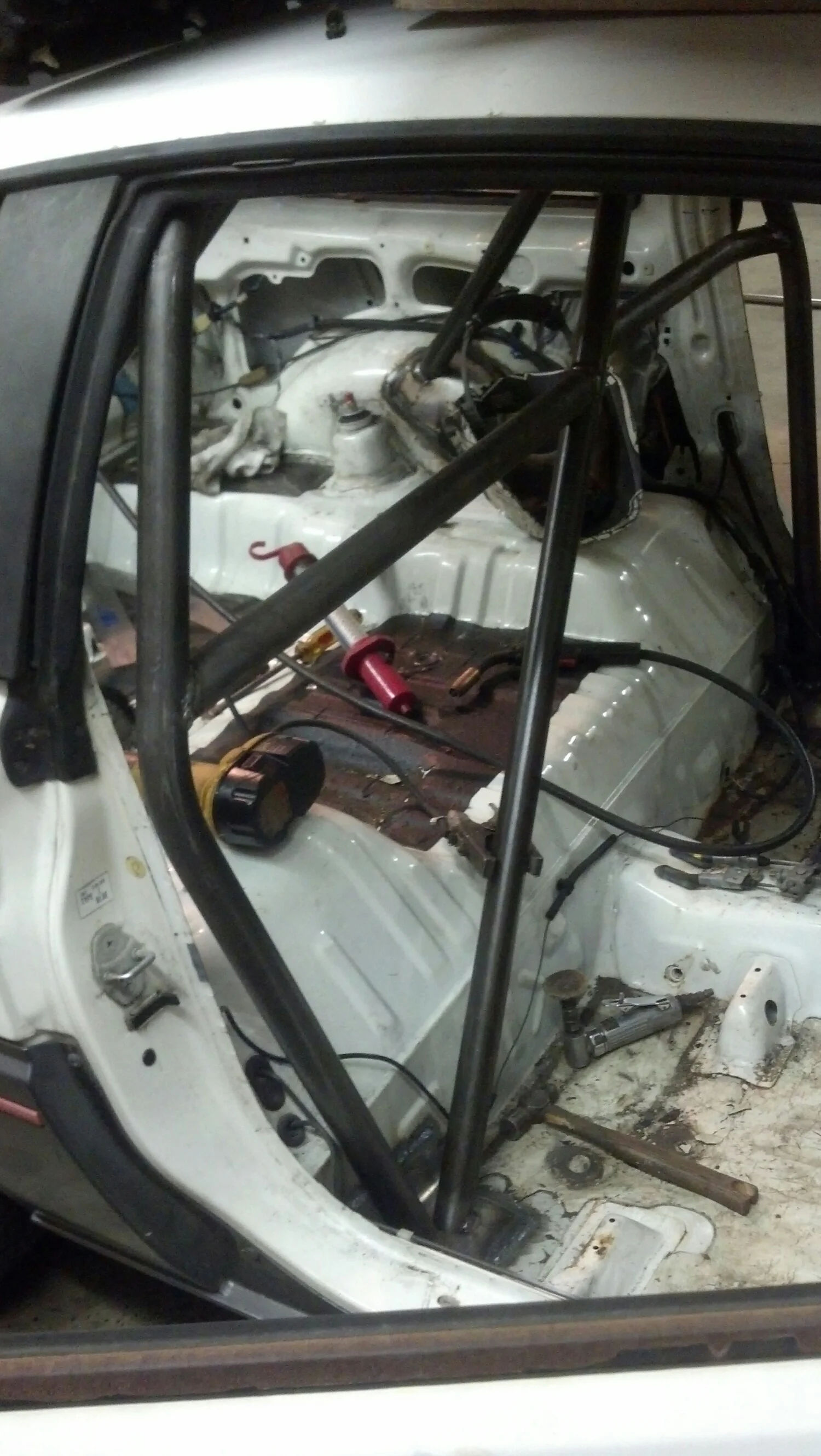 Its hard to find pics for an article on rules, so here is an in process cage fabrication pic of "the honey badger" (A someday- feature car here)