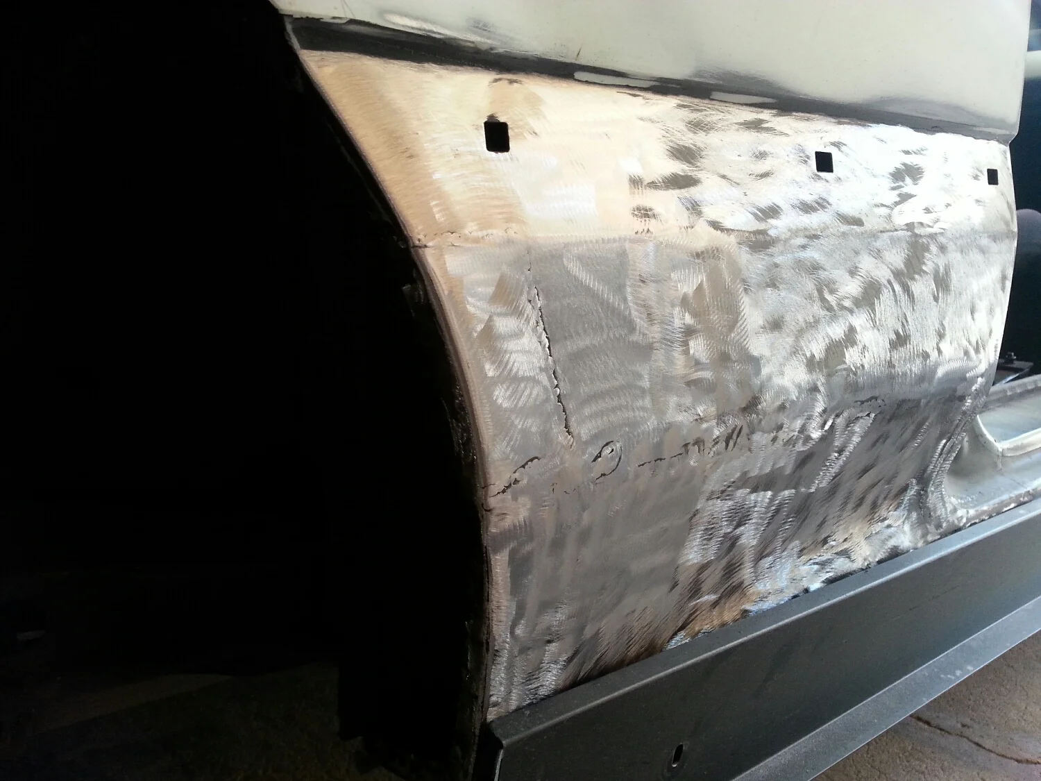 sand it/flap wheel it more. A light skim of body filler and a sanding and this disappears. 