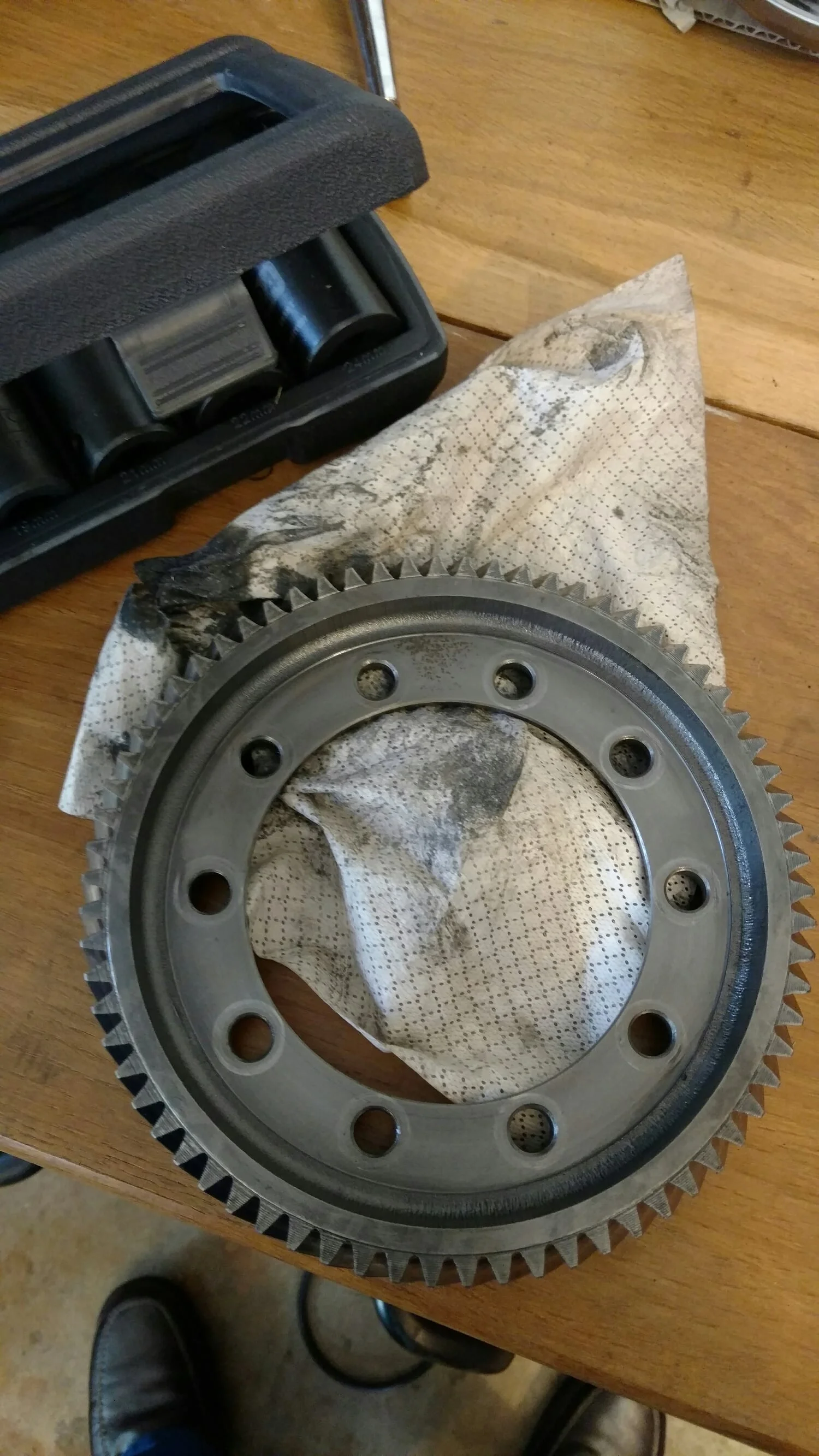 i had to take the SI 4.25 ring gear off to get the diff apart. These bolts are reversed thread.... Not righty-tighty bolts.. The diff bearings came off surprisingly well actually. Small amount of work prying with 2 screwdrivers. 