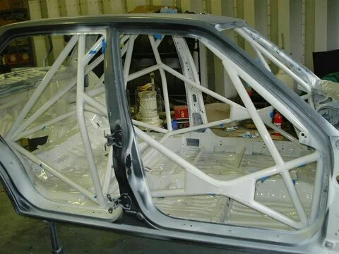 Christian Shipp's old ITA 4dr build is a favorite of mine. Look at all the connected node/load paths, the "tall guy" design of the hoop being further back, and really solid overall design. I should have bought this car. 