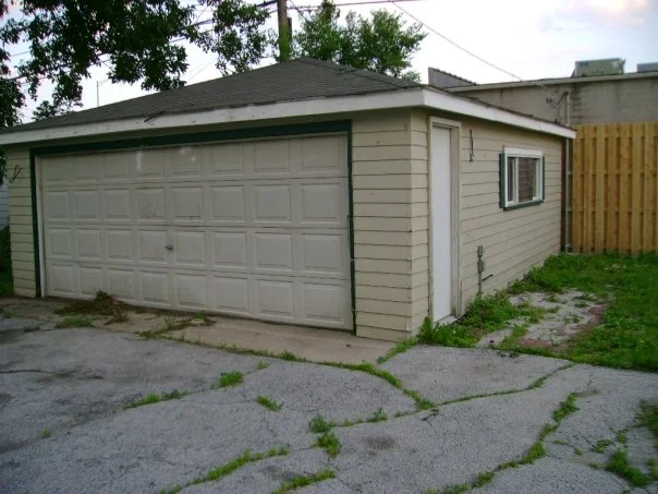 unhappy with your garage? do something about it.....like....pull it over with a big tractor and throw it into a dumpster. 