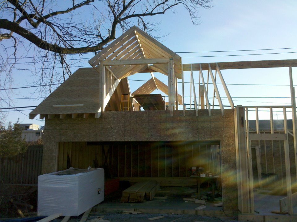 Partway through framing and exterior plywood. It might look nice and sunny, but remember, it was the middle of a chicago winter in this picture. Jeremy and Allison might have picked a bad time to start........ but they did it. 