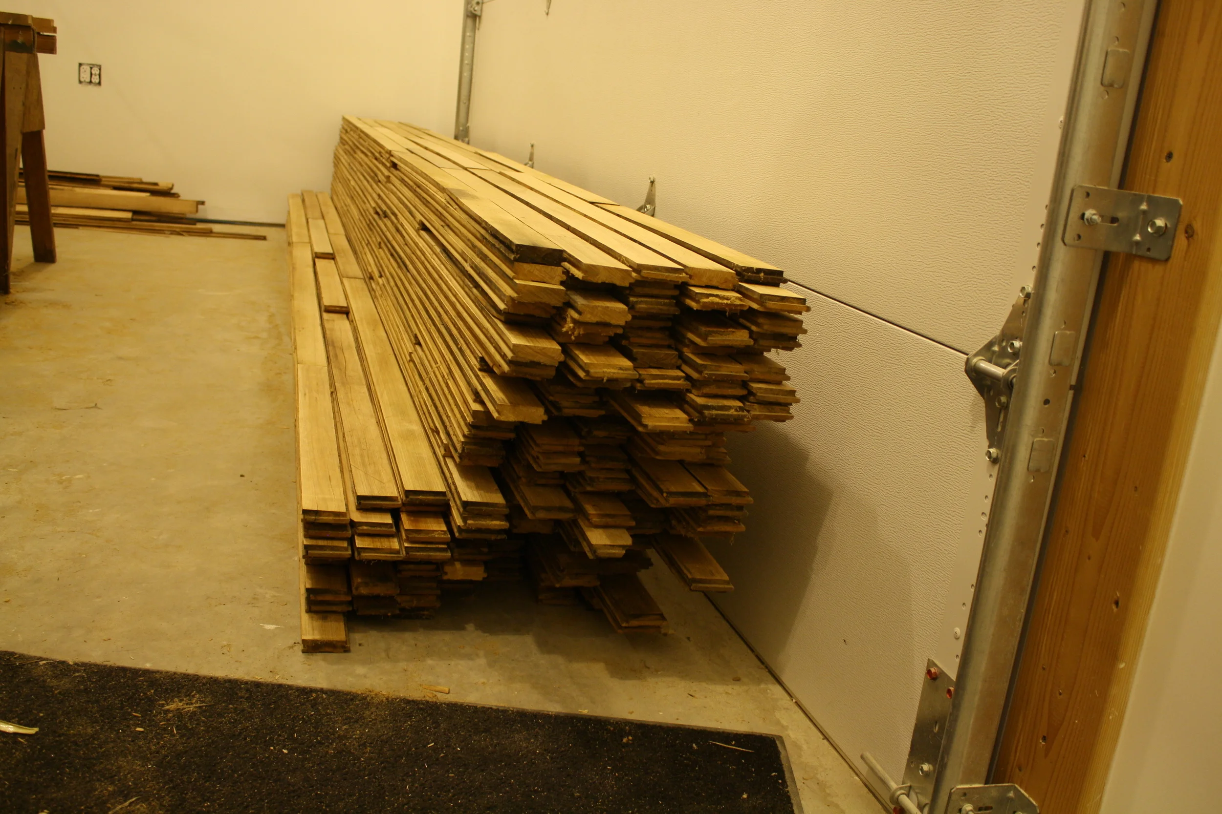Reclaimed maple flooring that was found in a shed behind a friend's house (thanks ryan!) was used in the loft portion. 