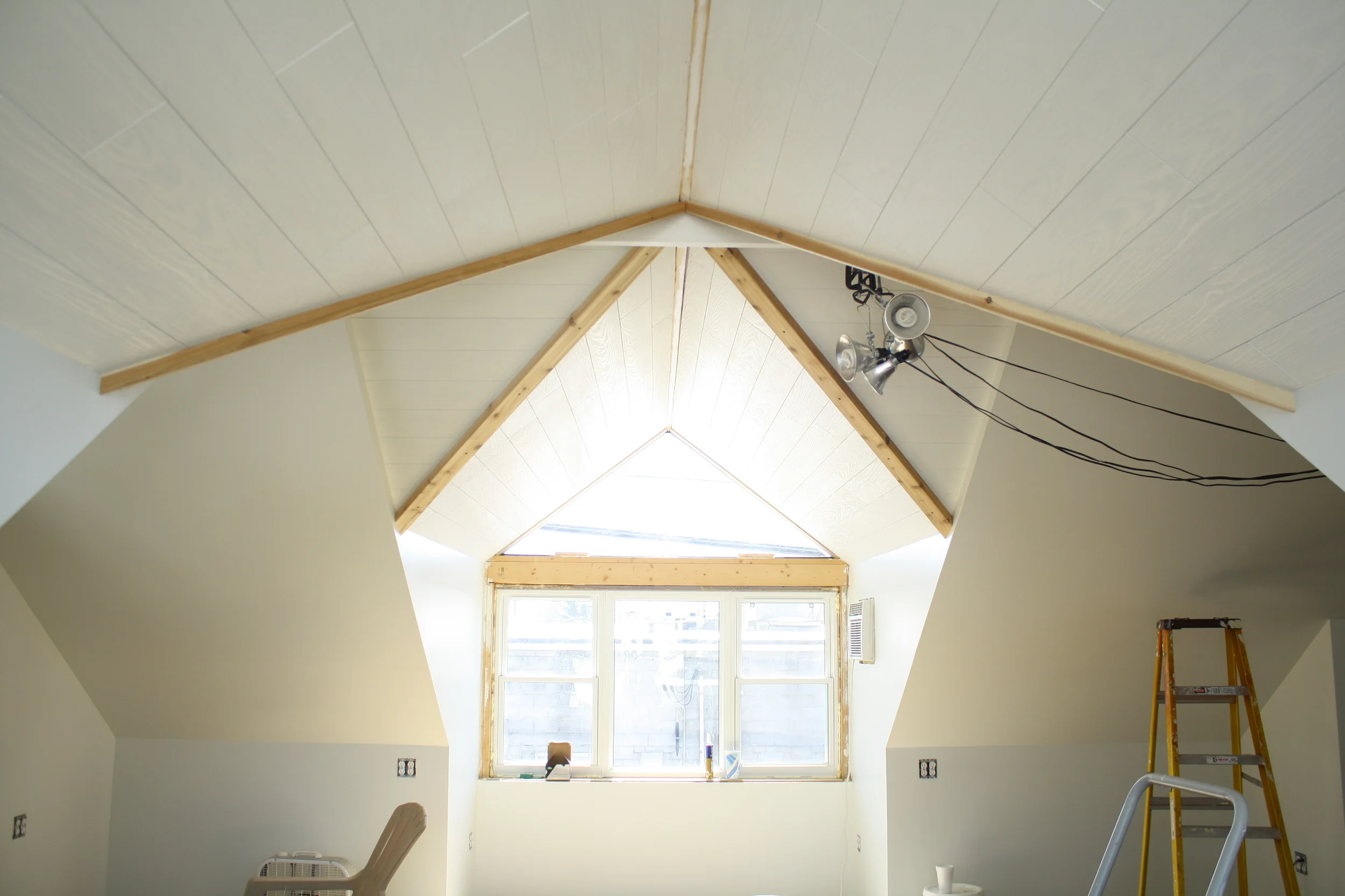 In progress work on the ceiling and lighting of the loft area