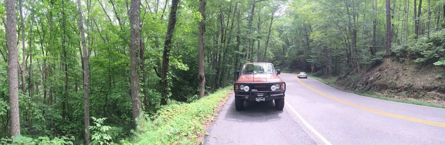 Dil and his brother Ashar took an ancient rad land cruiser down a few days early and had a good ole time. Tail of dragon pic?