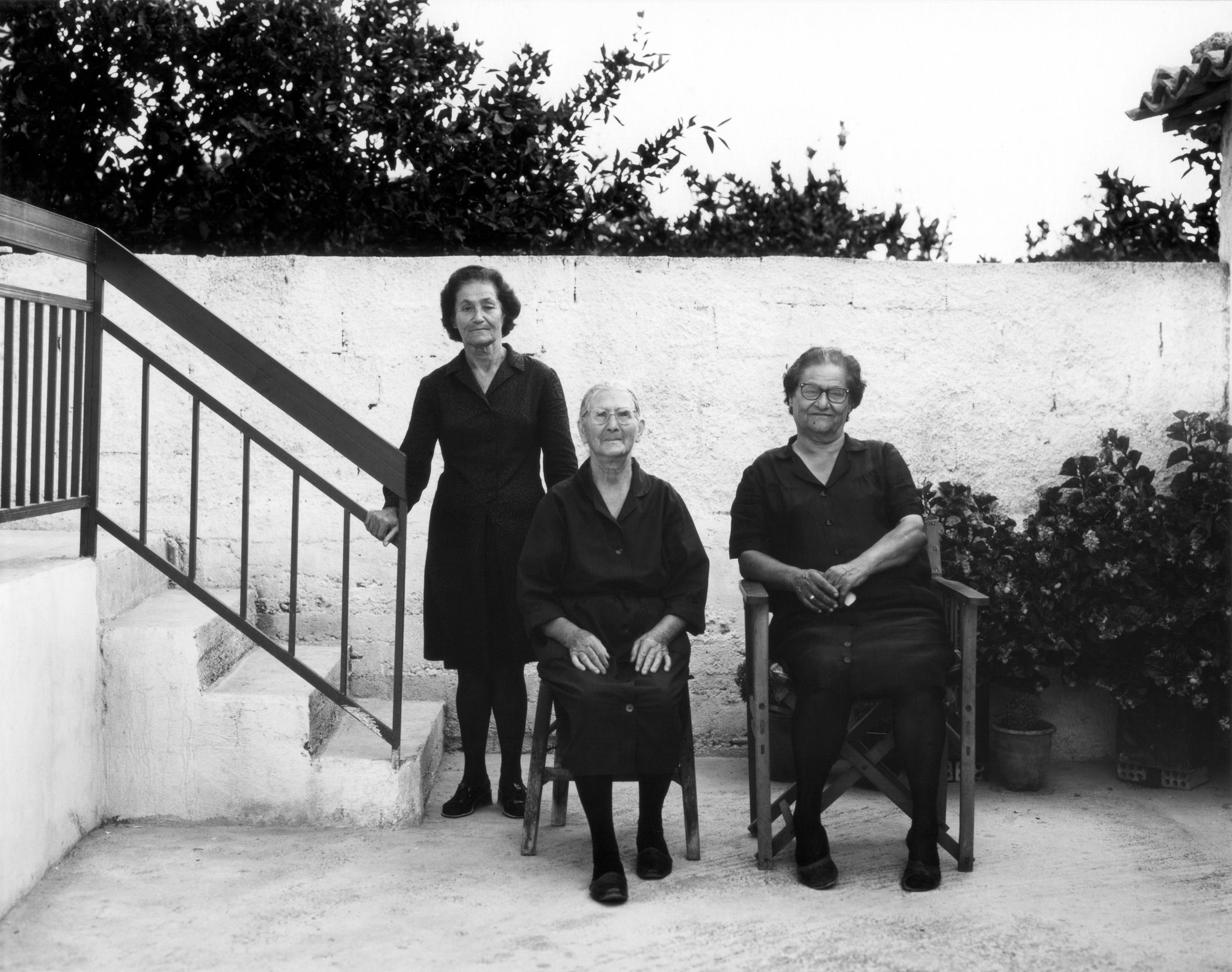 Erateini Portfolio, Katerina and Vasso Bouras, Ioanna Katsimiga, 3 neighbor women 1974 © Nick Merrick.jpg