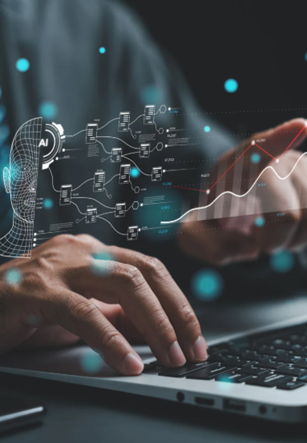 Man typing on a laptop