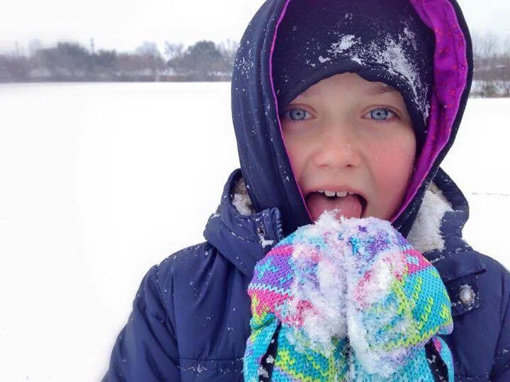 TrizCom Public Relations girl licking snow