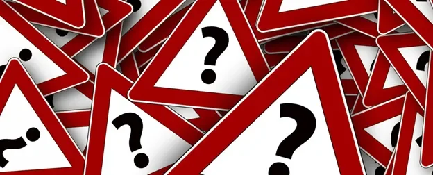 caution signs with question marks