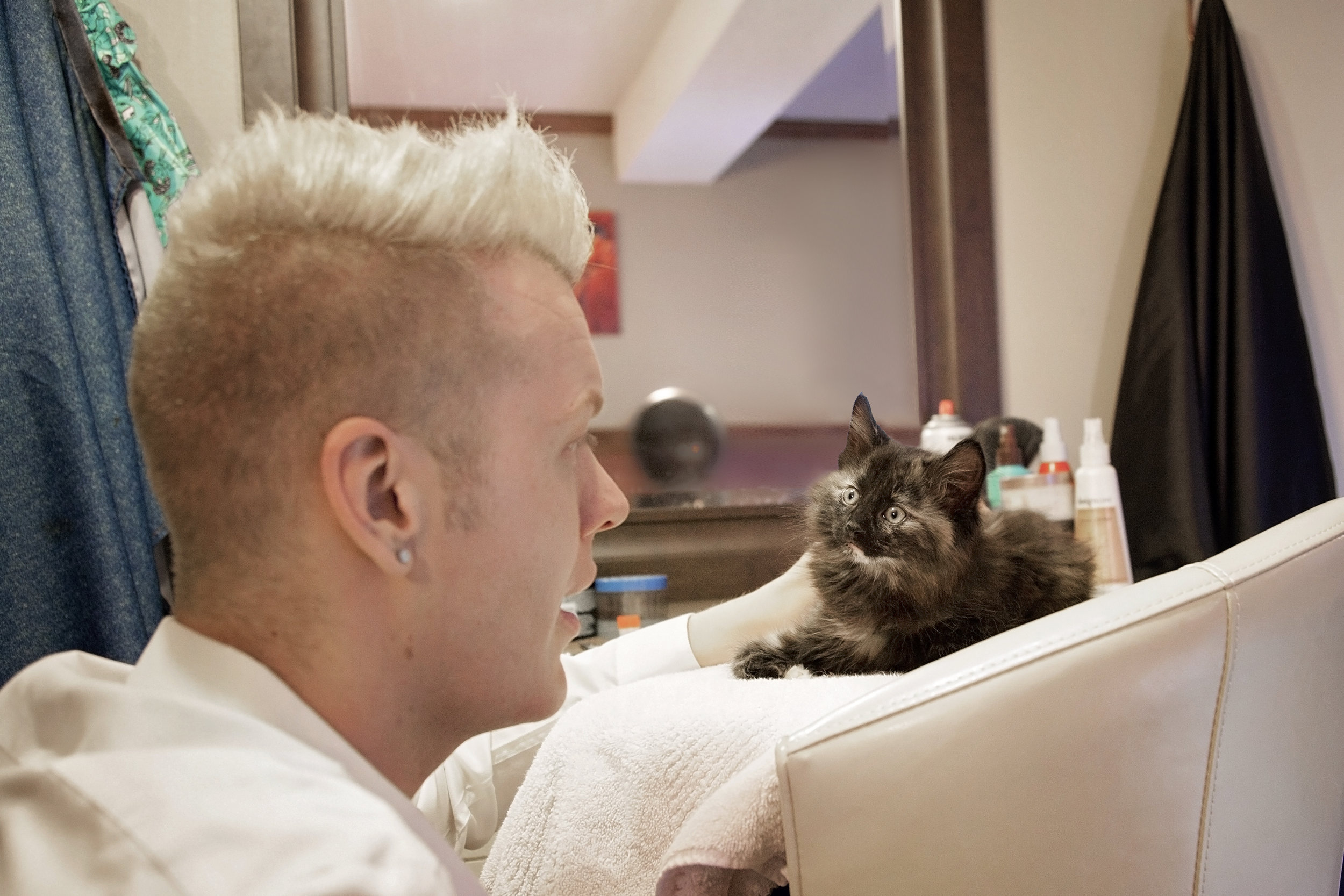 Keith Bastian of Chop Chop Salon poses with Pippa for the 2017 Men With Cats Calendar.