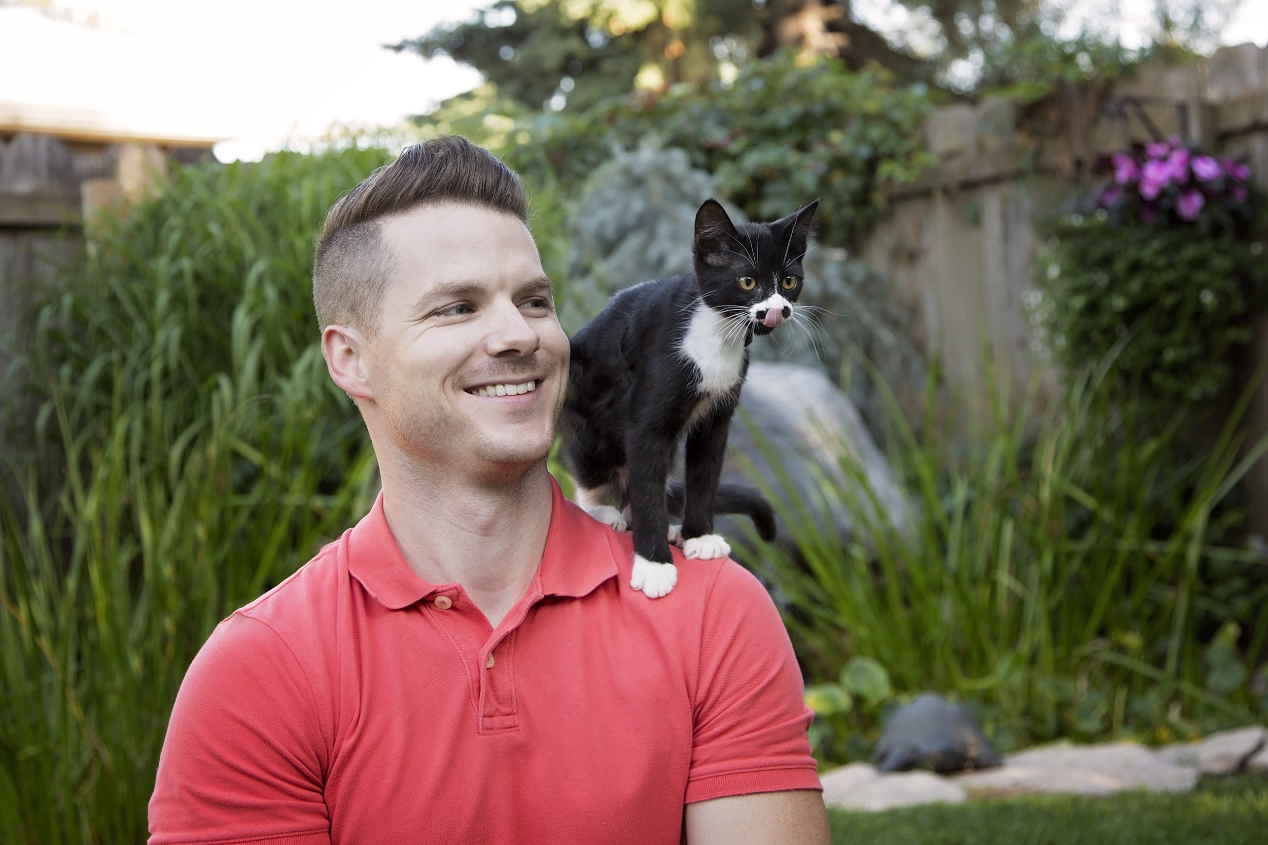 Jason Belanger, Chief Mine Maintenance Engineer of Potash Corp poses with Janny for the 2017 Men With Cats Calendar.