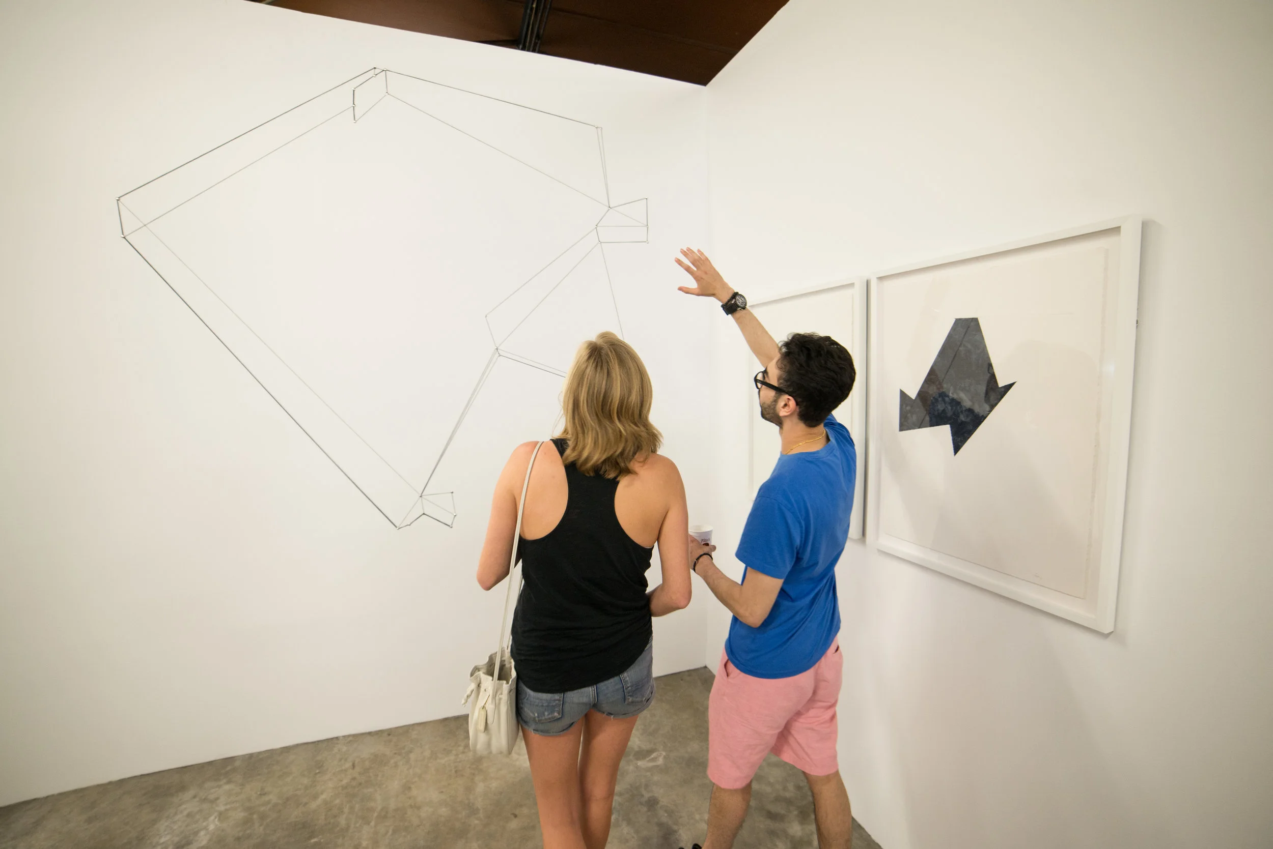 “Territory.” Site specific installation by Luisa Duarte for theTexas Biennial 2017, wax thread and thumbtacks, 77 feet x 11 feet.