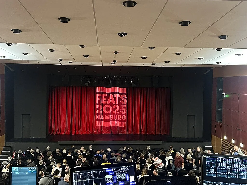 FEATS curtain with tech.jpg