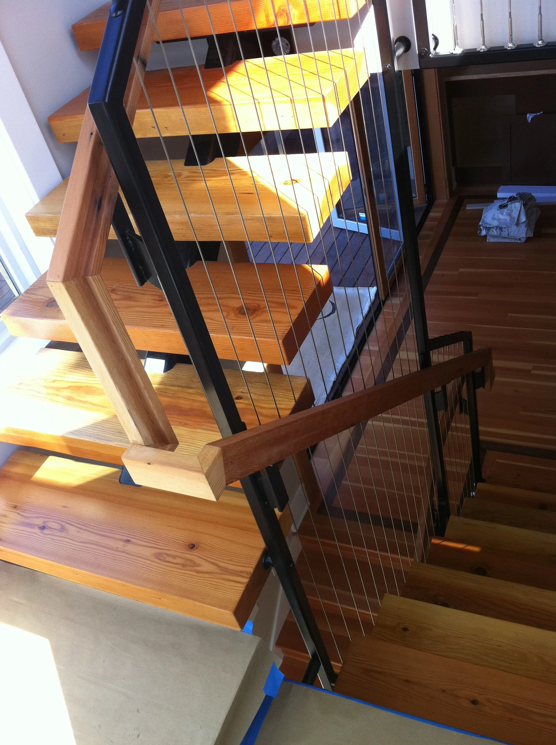 Three stories of continuos stainless cable.