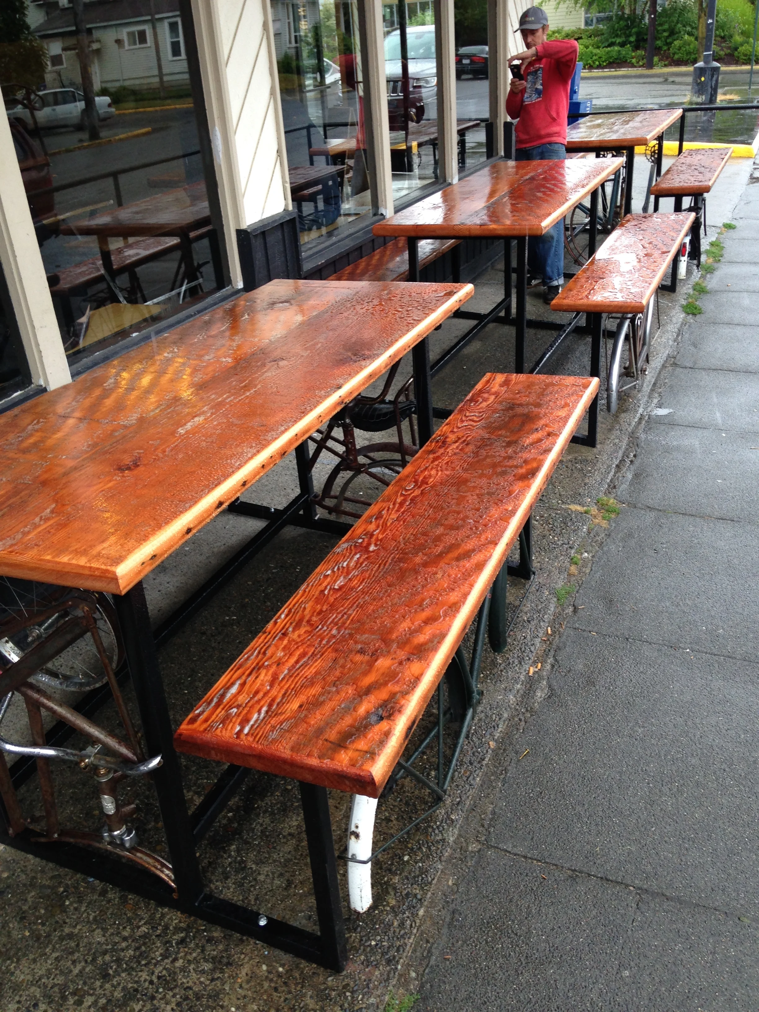 Table and bench tops made from floor joists reclaimed from Birchwood Elementary.
