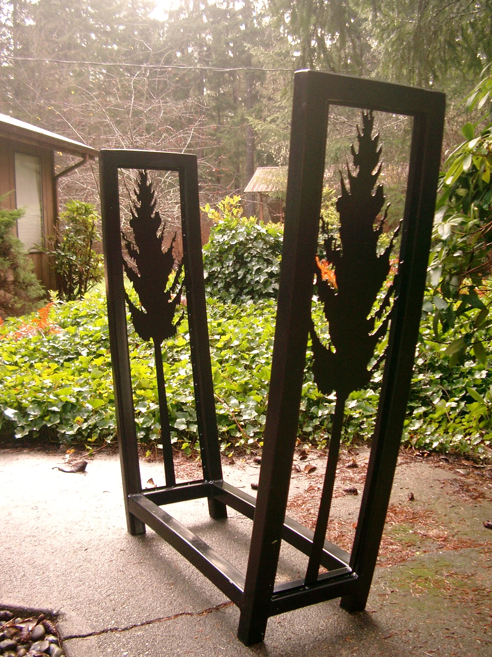  Powder coated steel firewood rack. 