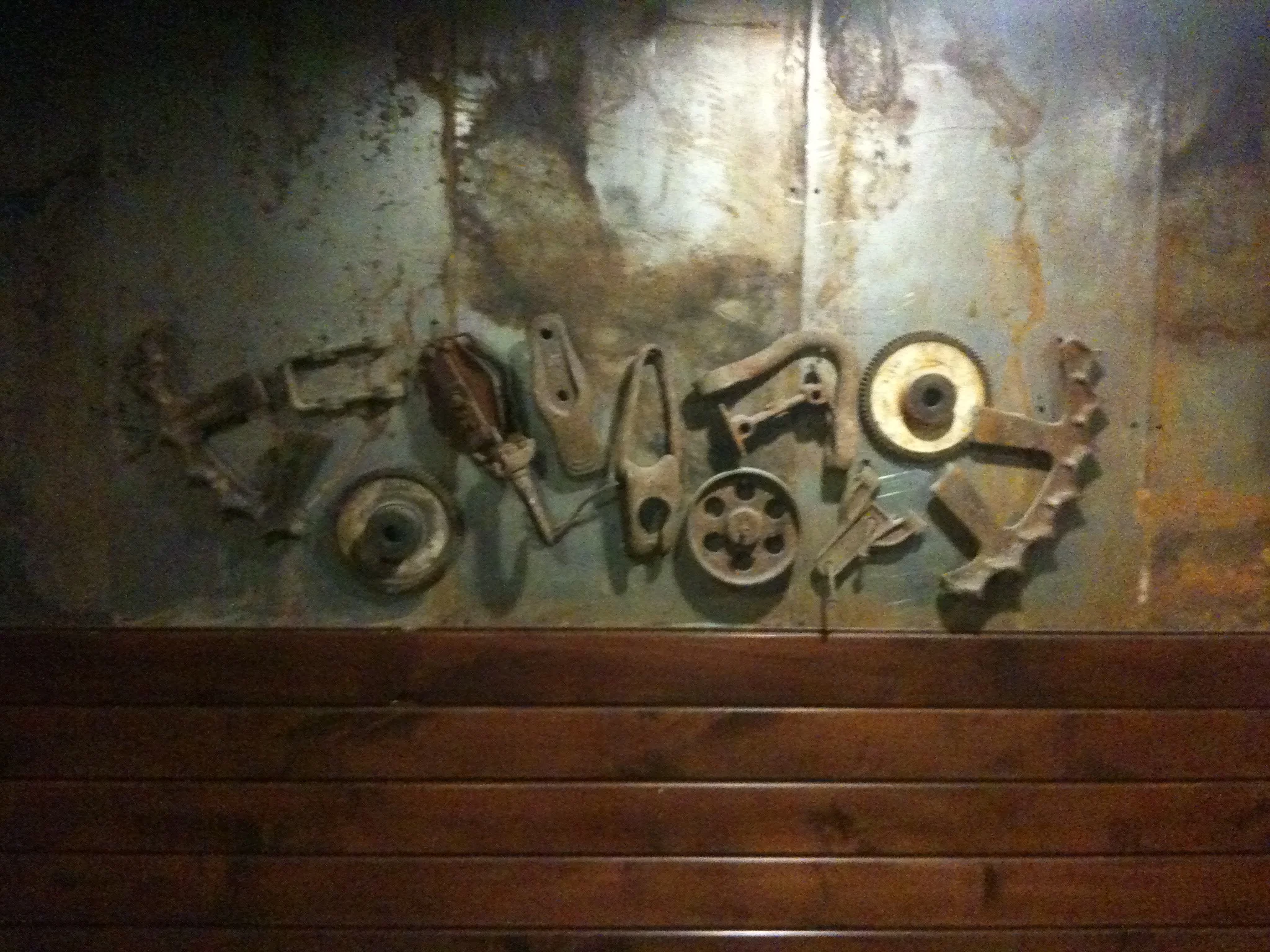Industrial salvage art wall piece.