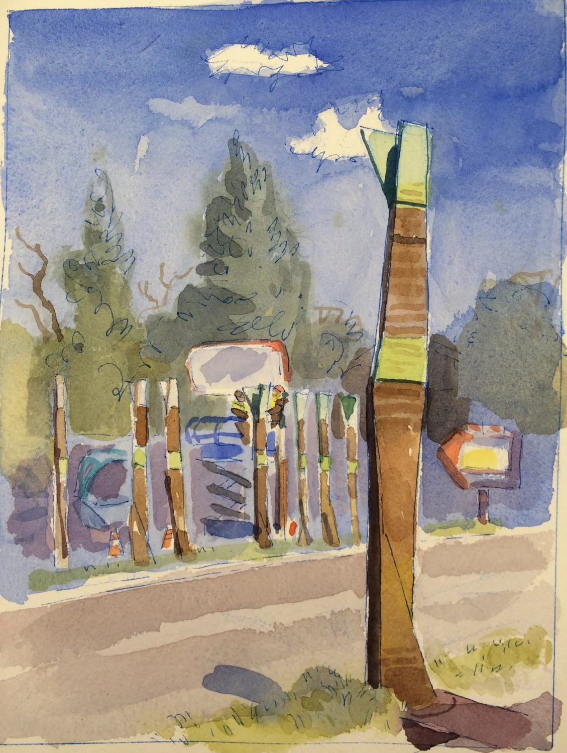 Brady and Nagmay screw in another panel. The background on either side of the road is going to change drastically the next couple years as the lot occupied by the strip club and boat yard are built over. 