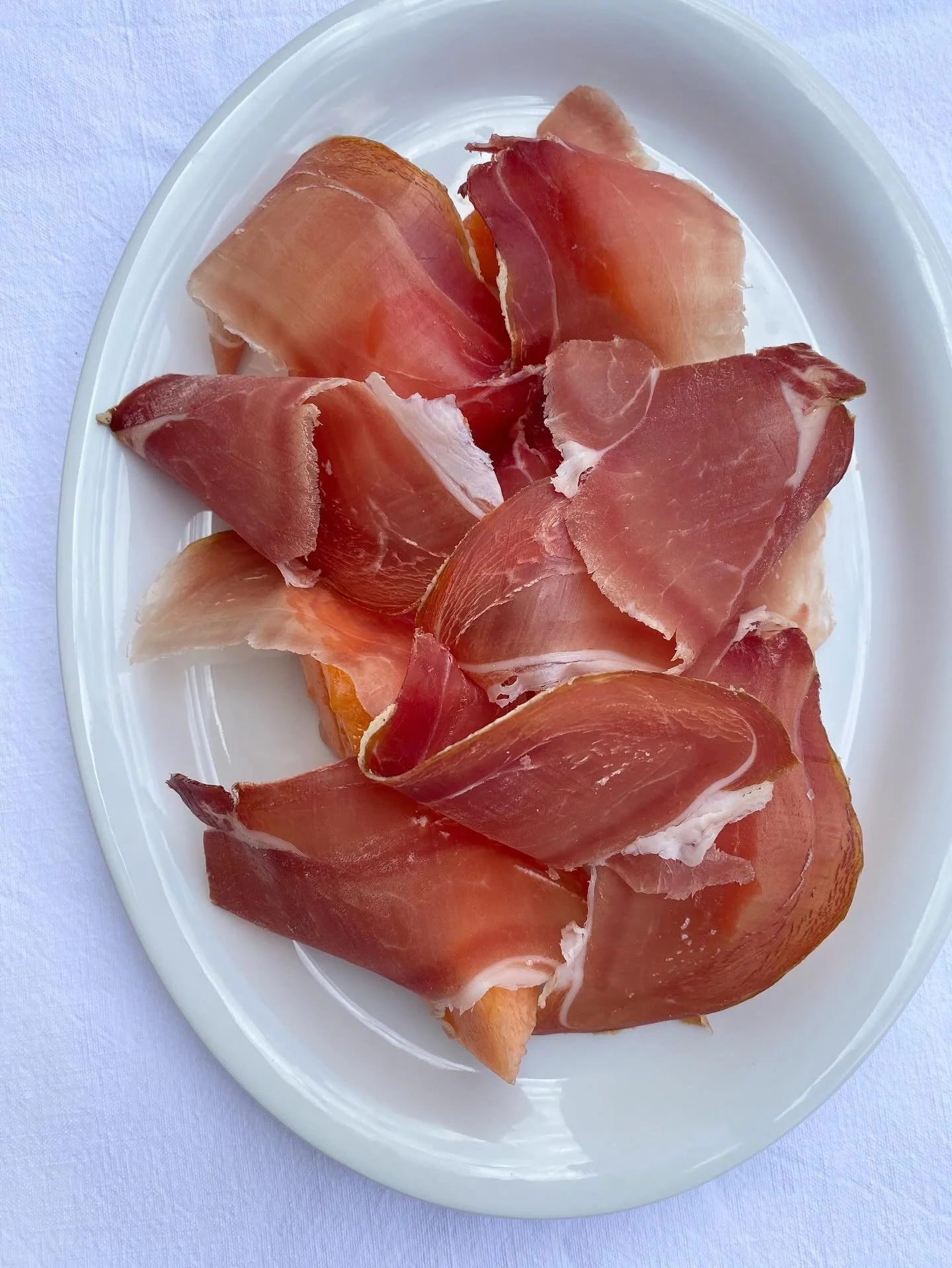 Prosciutto and Charentais melon for Abbi and Chris and their 60 guests. Served alongside burrata with @honest_toil and our cauliflower, green olives, parsley, lemon and pistachios dish for starters. Devilled crab gem cups also pictured during recepti