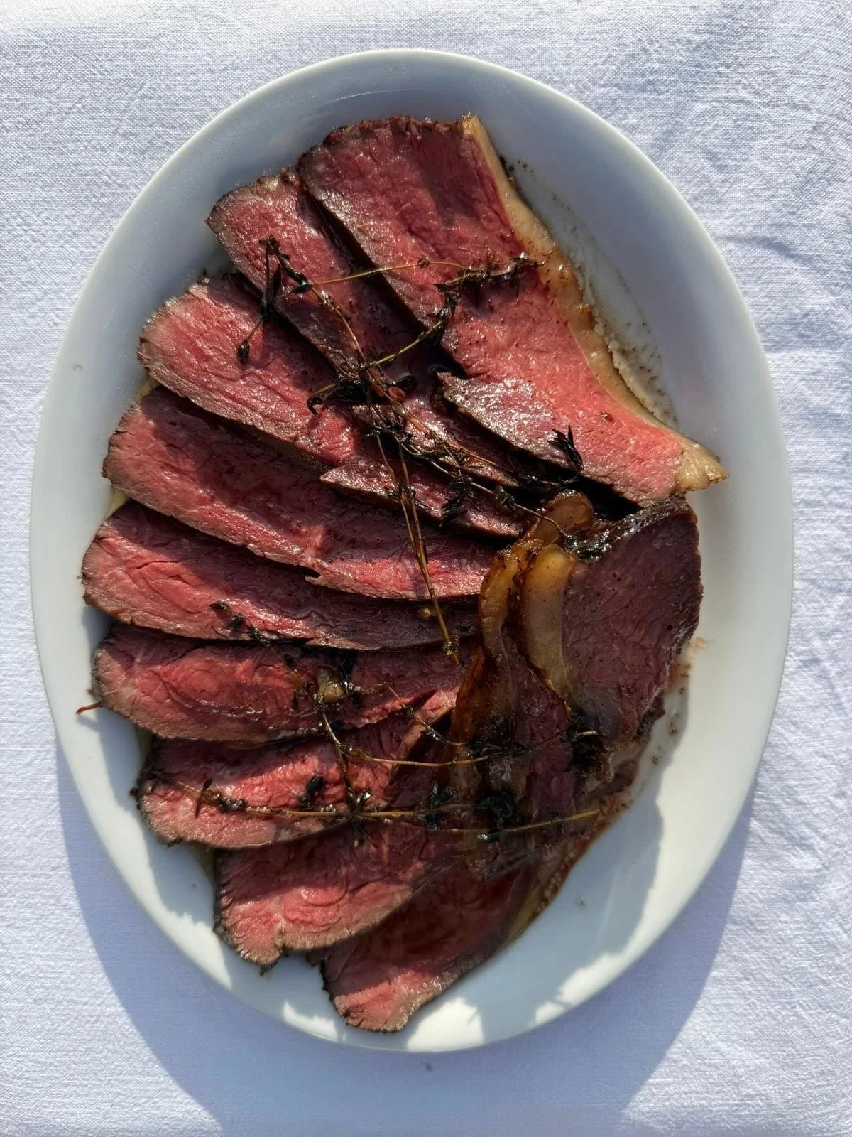 Belted Galloway @swaledalebutchers beef rump served with salsa verde for Persephone and Calum and their 110 guests. Bagna cauda, crudit&eacute;s and focaccia served before it, Amalfi lemon posset with ricciarelli afterwards and plenty more in between