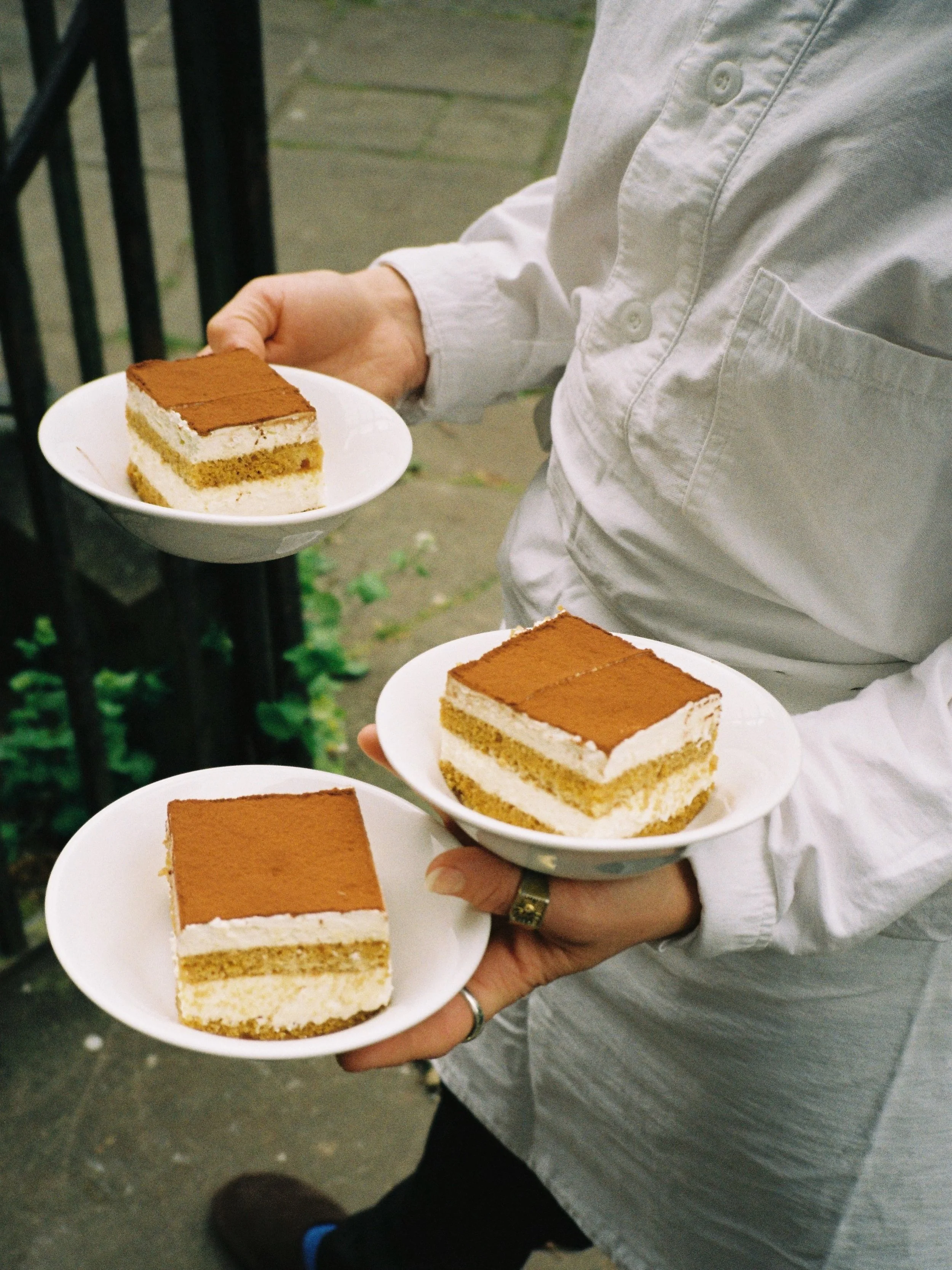 Some love for our sweet tiramisu 🤎 🎞️ First we make our Genoise sponge - light and fluffy. Next we soak the sponge in a thick salted caramel, amaretto and coffee syrup. Finally we make a sweet whipped cream, egg and mascarpone mixture before layeri