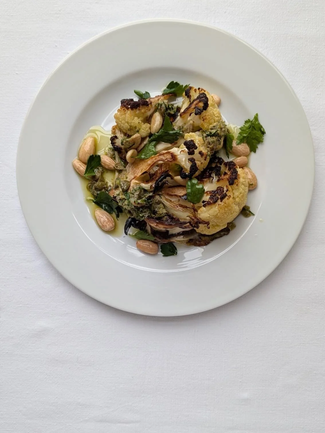 Cauliflower, capers, gremolata and almond sauce for Livi and Cameron&rsquo;s vegan guest&rsquo;s mains @northcadburycourt. Other highlights included canap&eacute;s of smoked cod&rsquo;s roe with cucumber and onion seeds, taleggio arancini and butterm