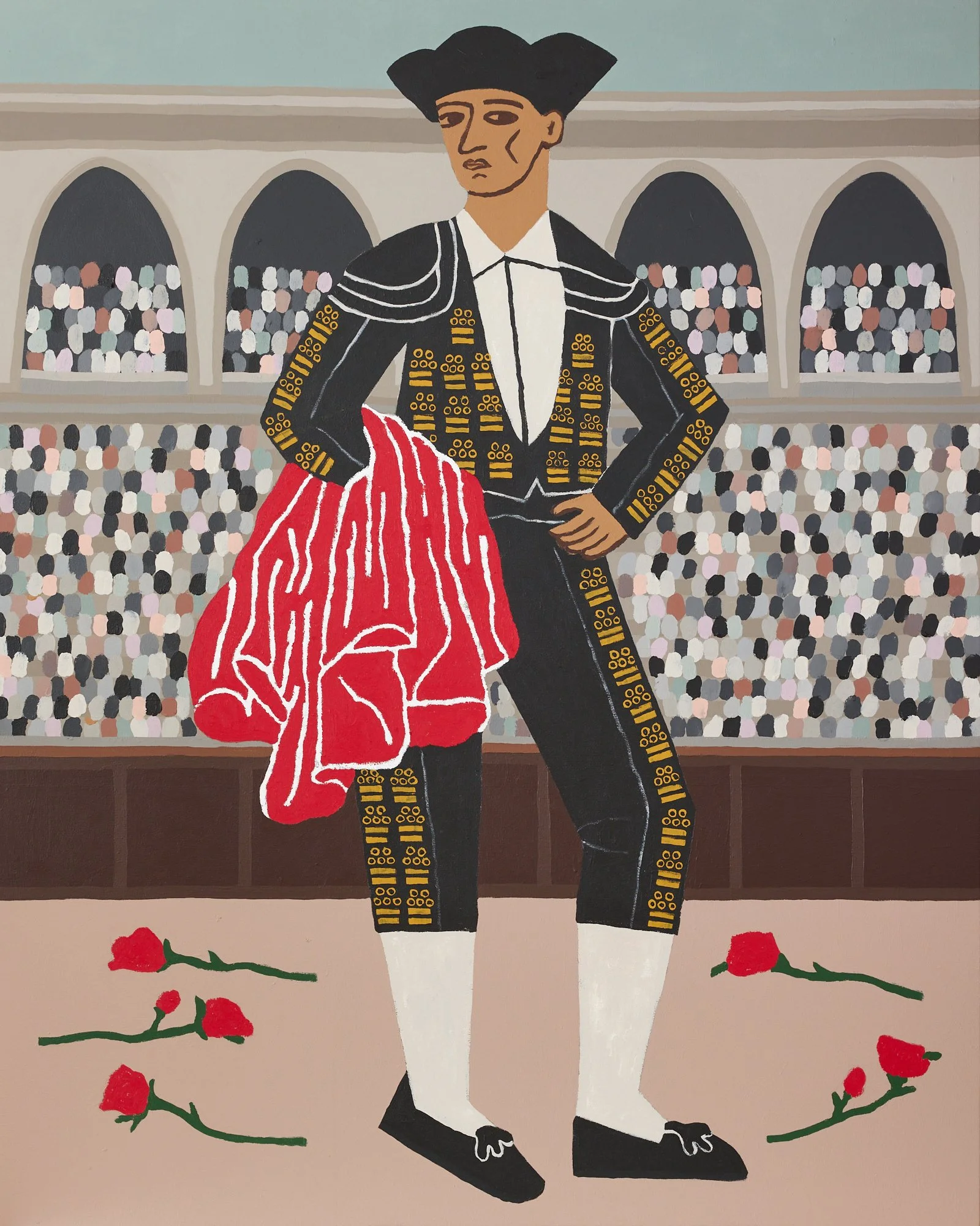 A MATAOR STANDING IN A BULLFIGHTING ARENA IN FRONT OF A CROWD WITH ROSES STREWN ON THE GROUND