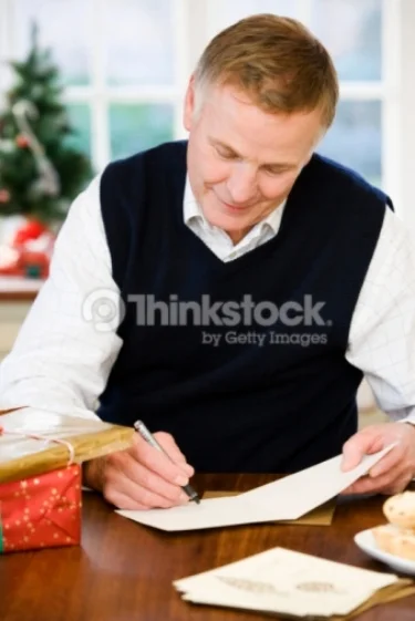 Man writing greeting card.jpg