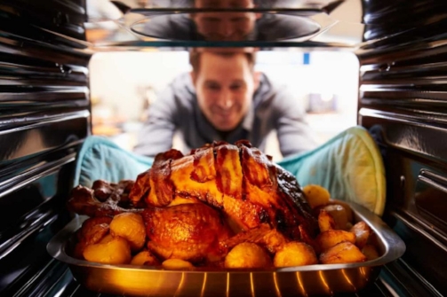 Man Roasting Turkey