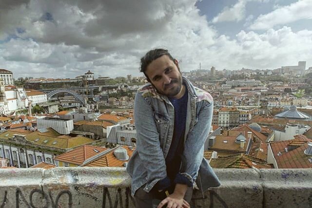 Jacob's first trip across the pond.  We made it to #Portugal ! Here he is perched in his unnatural habitat - a lookout in #Porto .