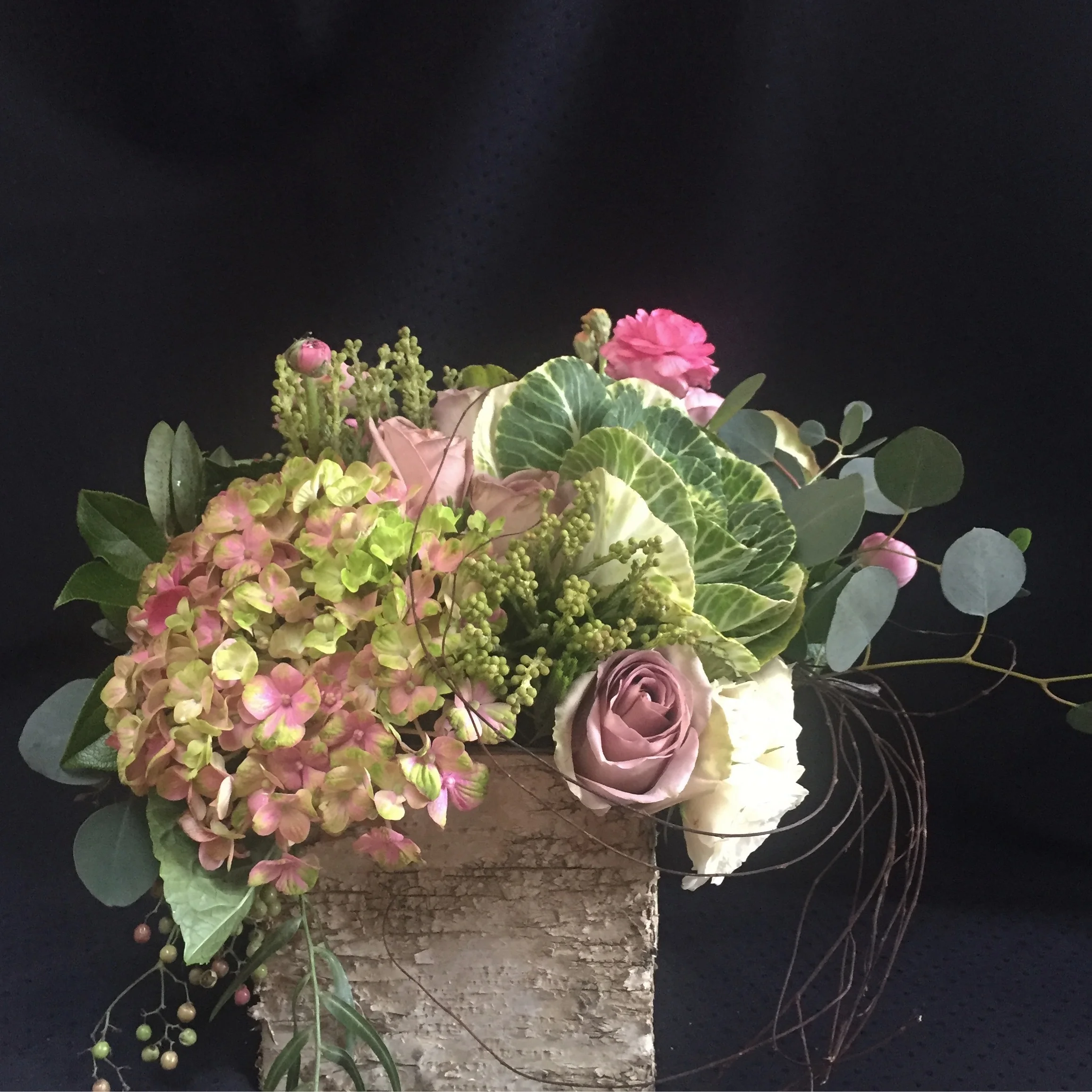 Arrangement in birch bark, pink hydrangea, roses & eucalyptus